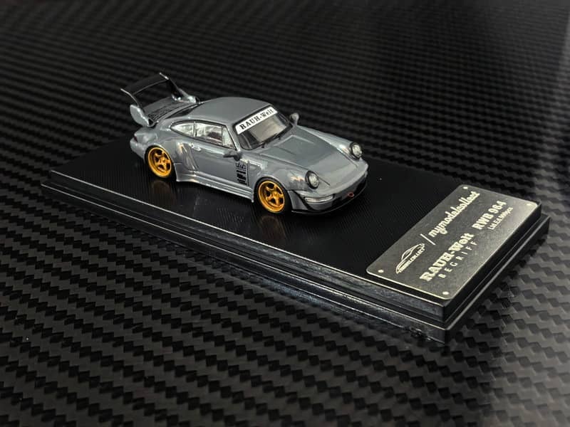 PO-$160 * MODEL COLLECT * 1:64 RWB964 HIGH WING CEMENT GREY