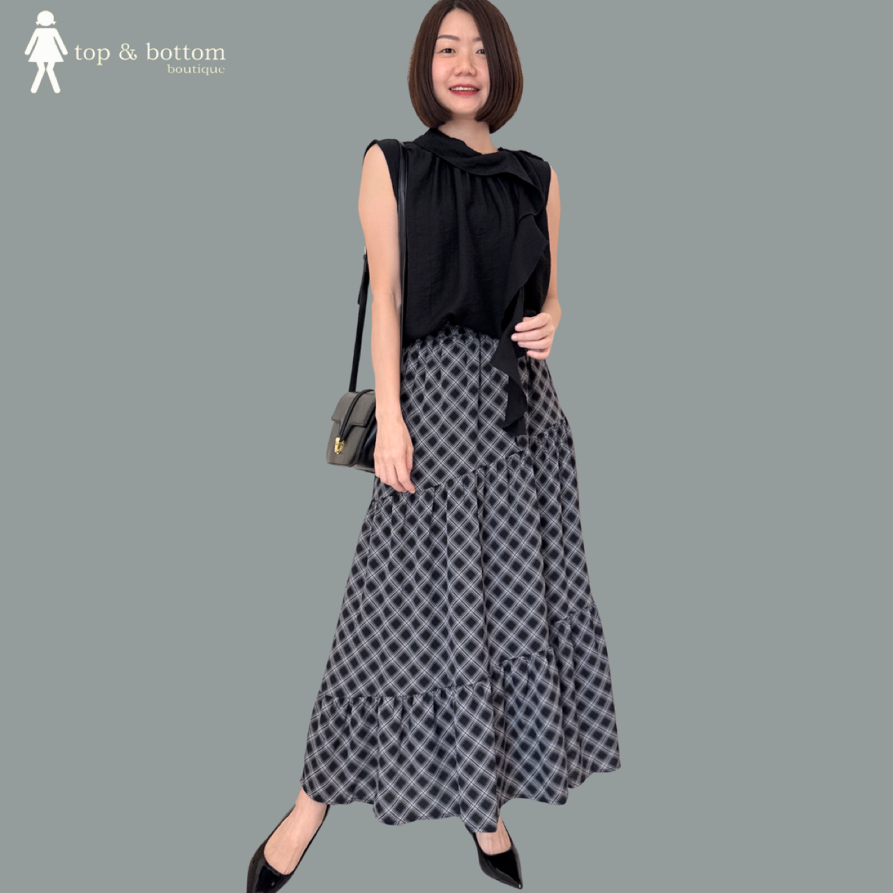 SLEEVELESS CHIFFON BLOUSE WITH FOLDED NECK & FRILLS