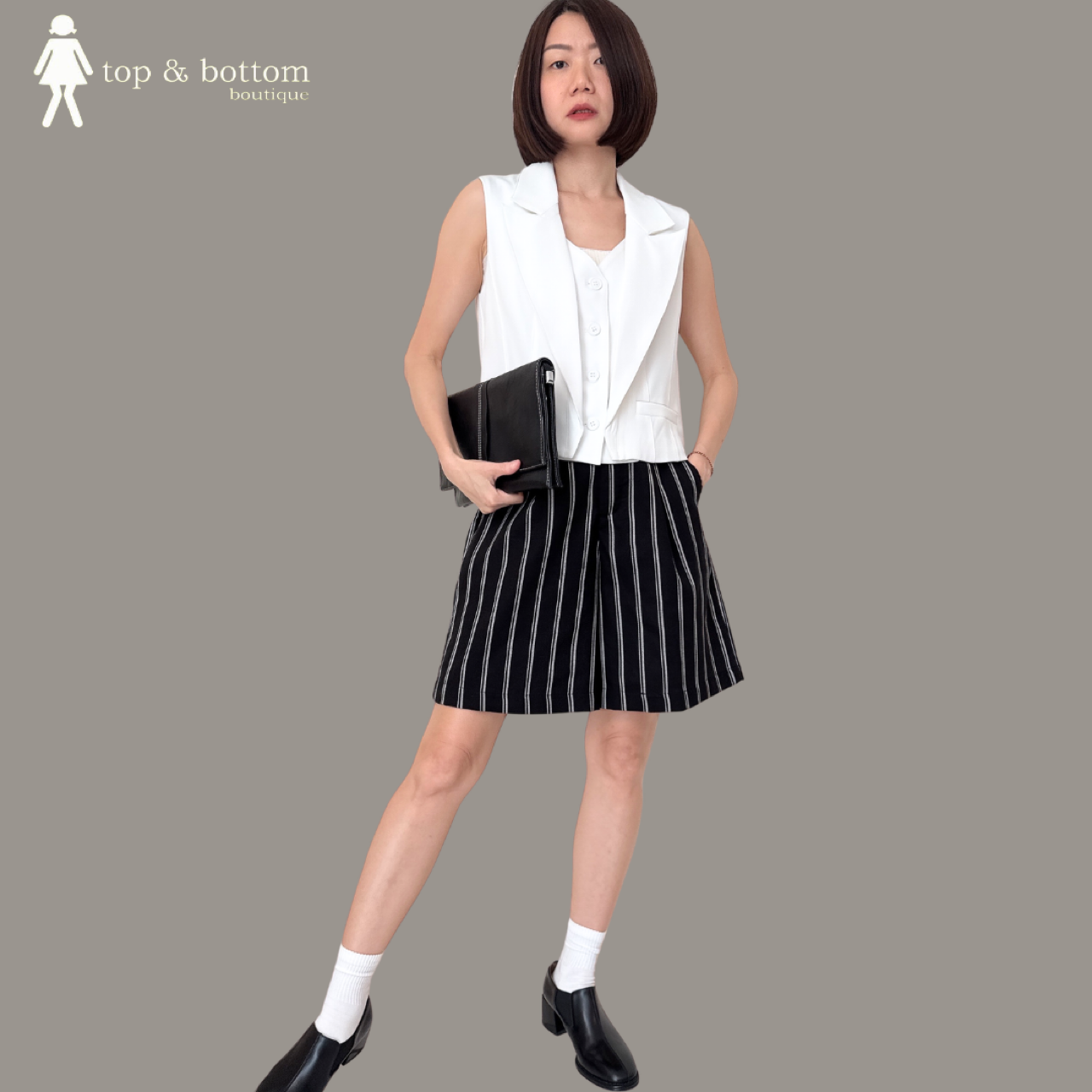 SLEEVELESS DOUBLE LAYERED VESTED BLOUSE