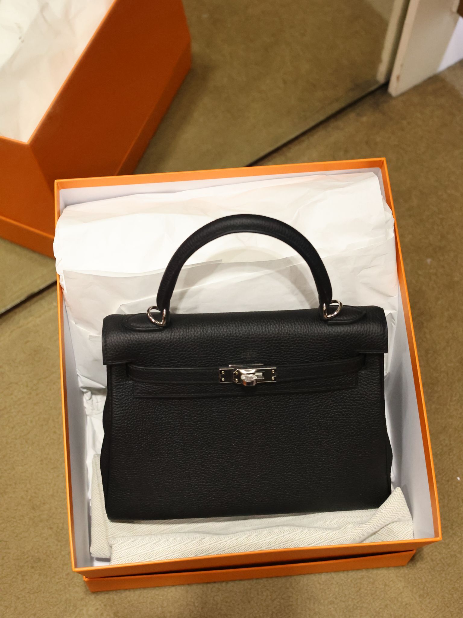 Kelly 25 89 noir ck togo G
