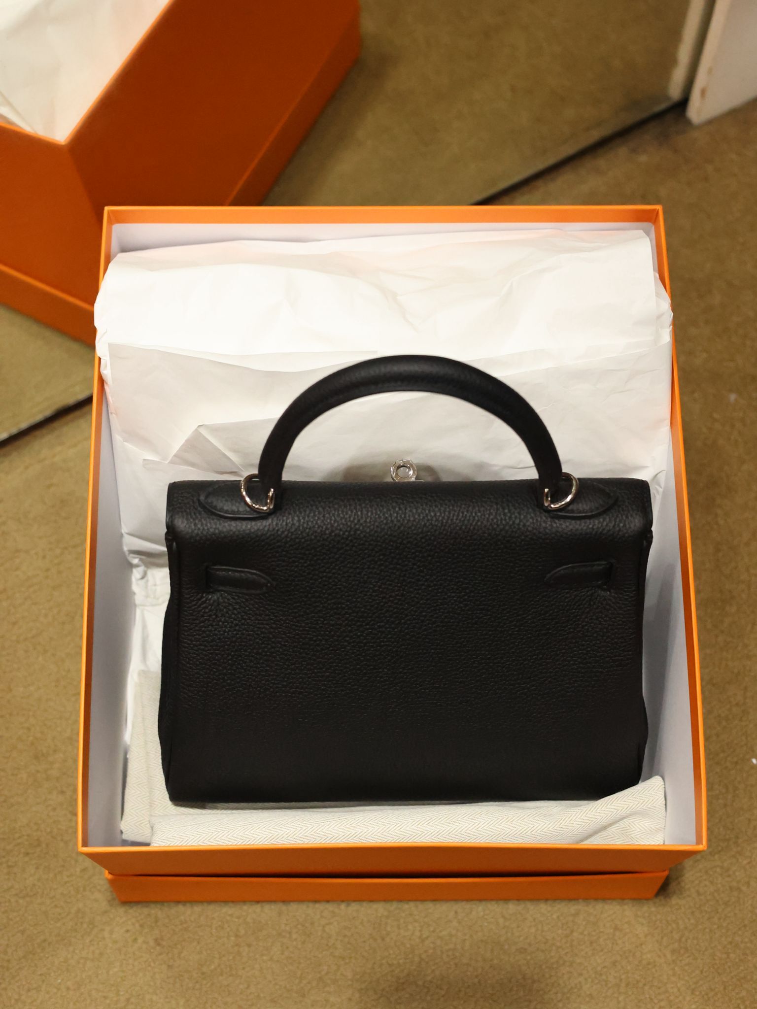 Kelly 25 89 noir ck togo G