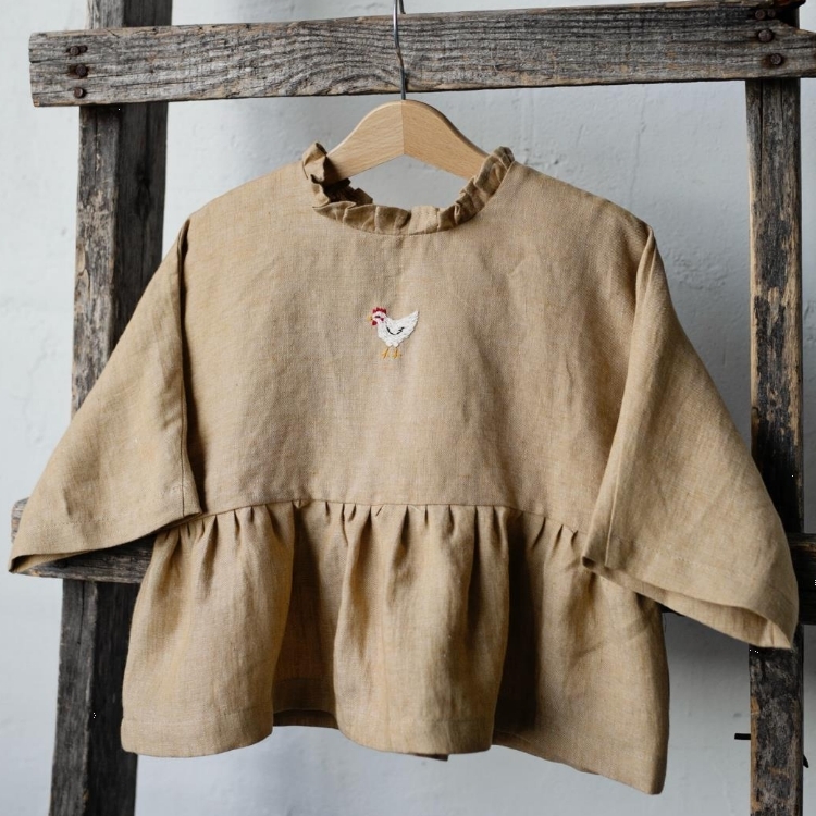 (預購)ALL THE BEAUTIFUL LINEN 後綁帶荷葉下擺上衣 NORTH TUNIC