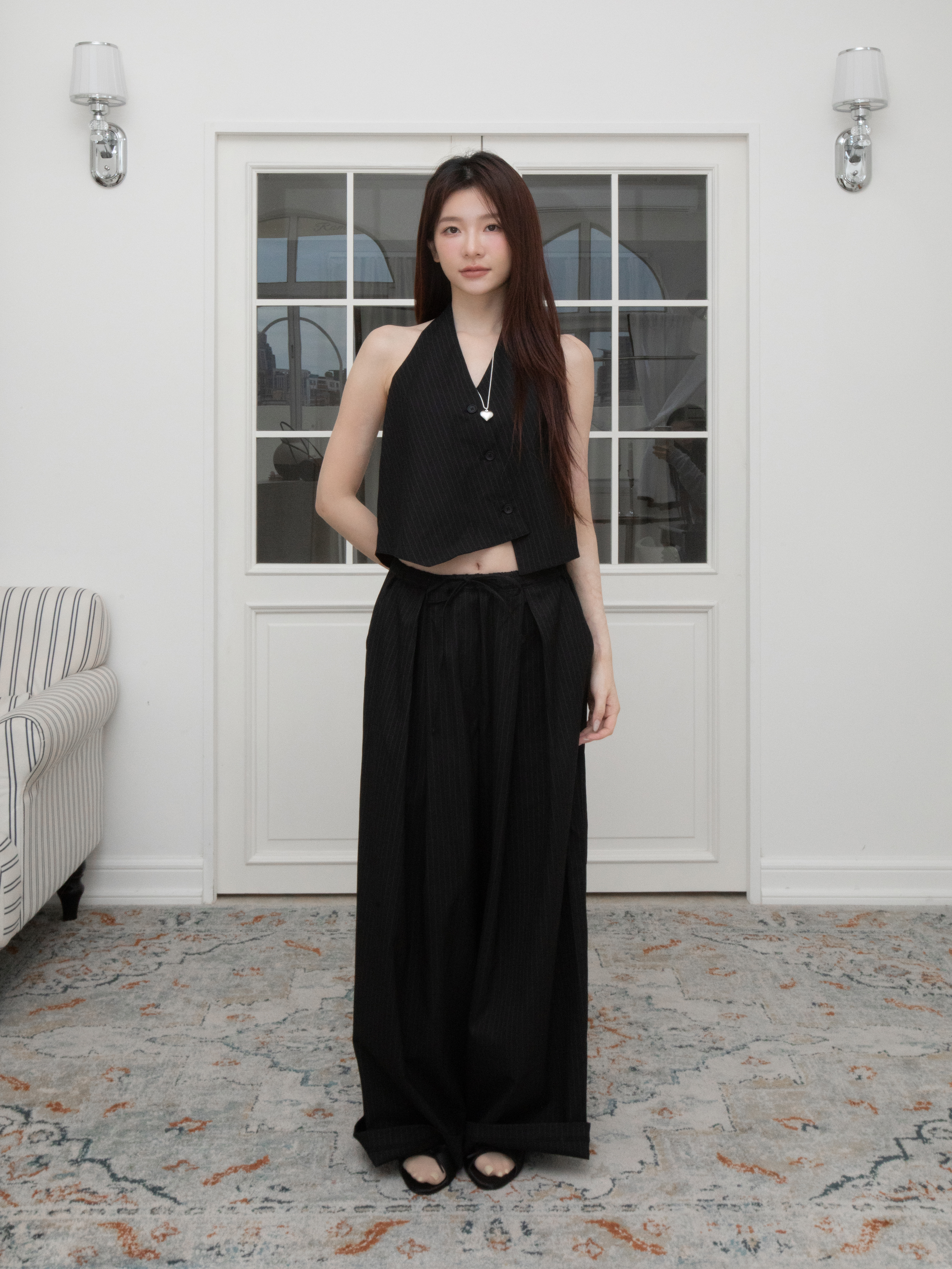 T03 ASYMMETRIC BUTTON FRONT HALTER VEST