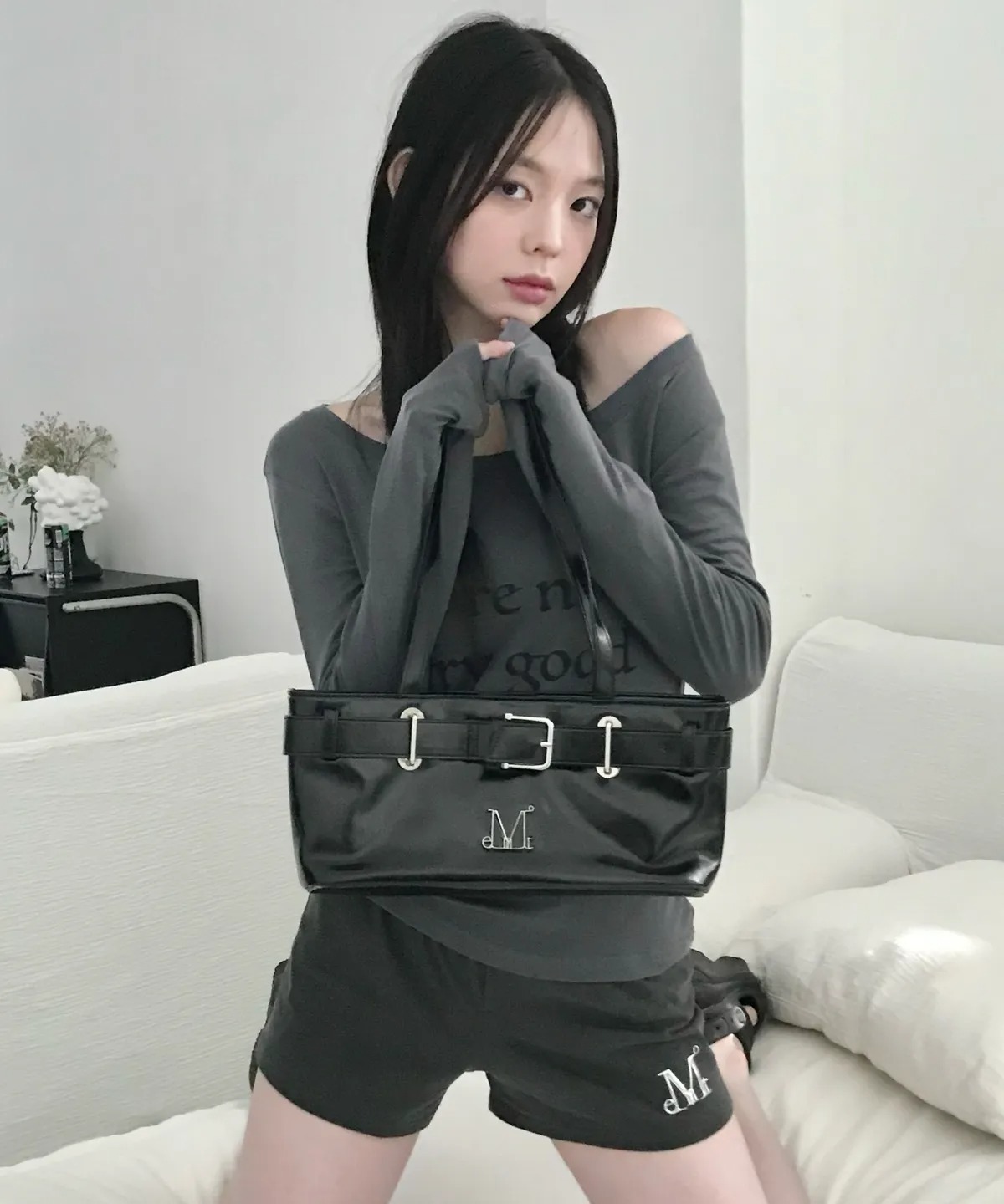 MUCENT SENTIC METAL LOGO FRONT BELTED LEATHER SHOULDER BAG UNISEX
