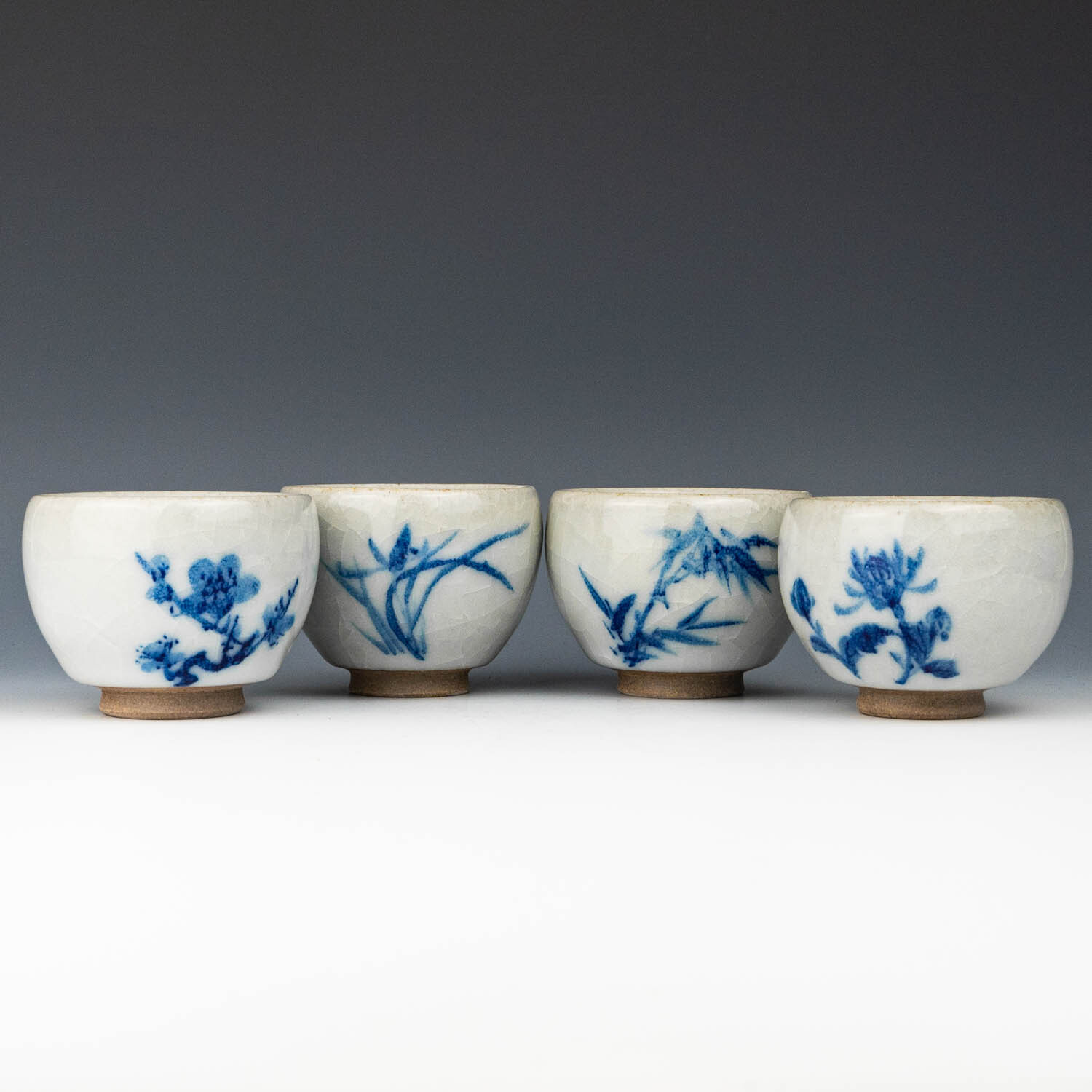 【陳明謙】釉燒｜茶杯｜羊脂白玉青花四君子蛋型杯 (單件)
