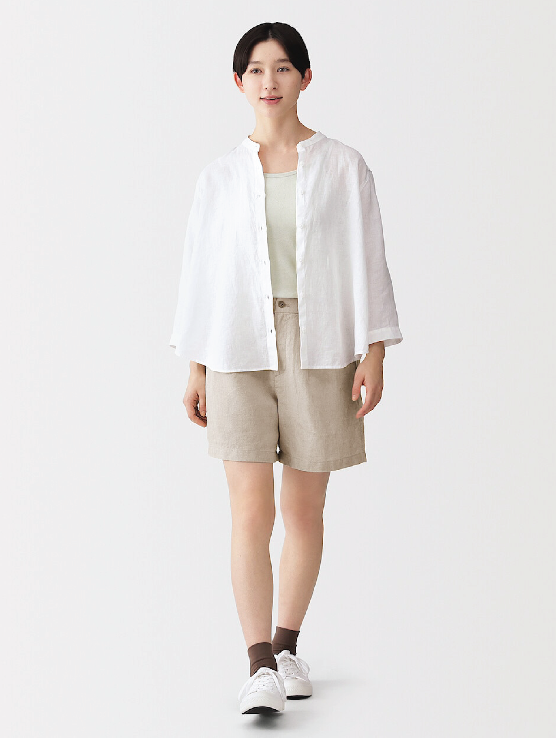 Model wearing linen dress
