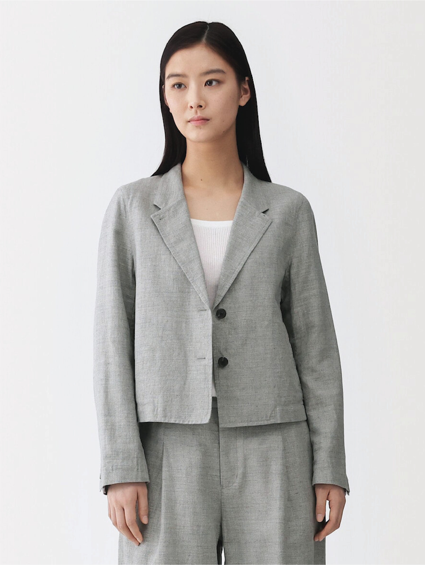 Model wearing linen dress