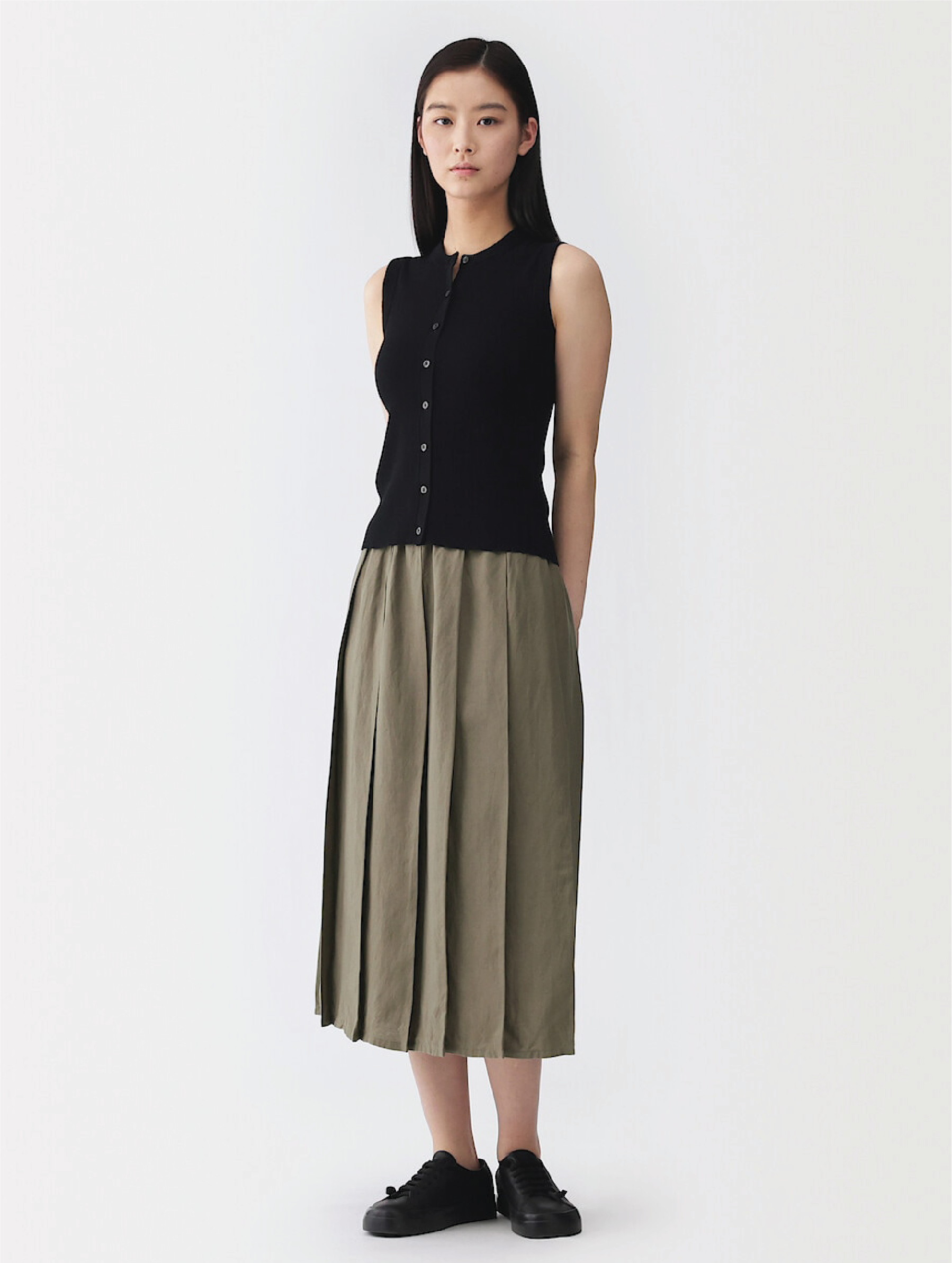 Model wearing linen dress