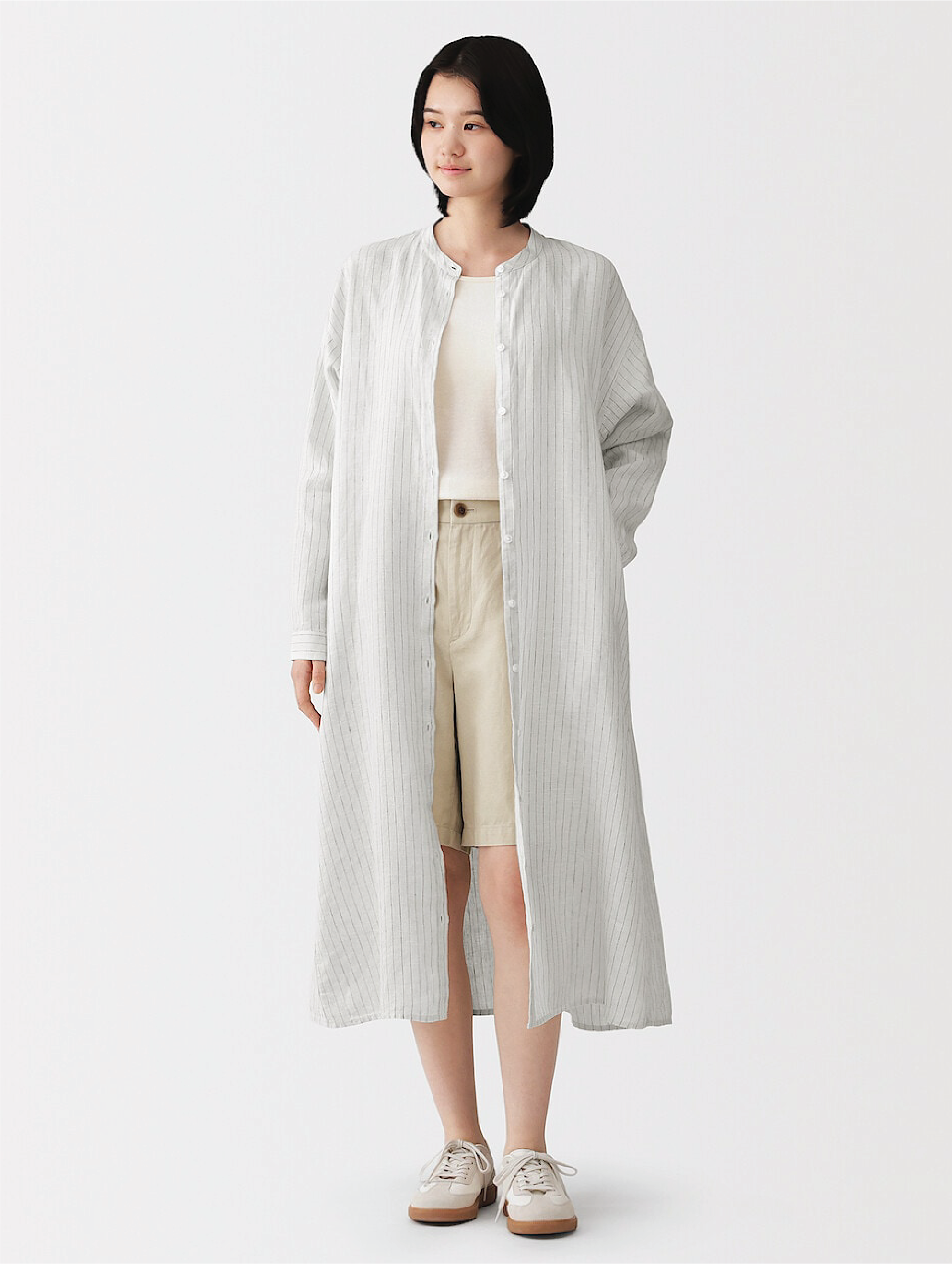 Model wearing linen dress