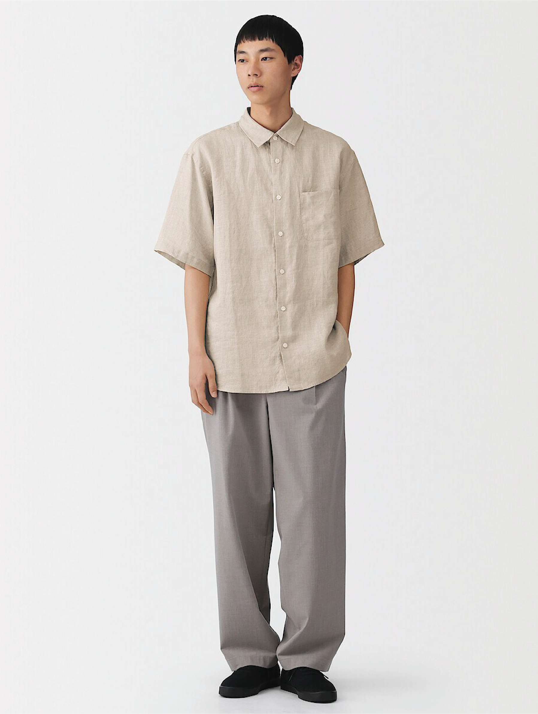 Model wearing linen dress