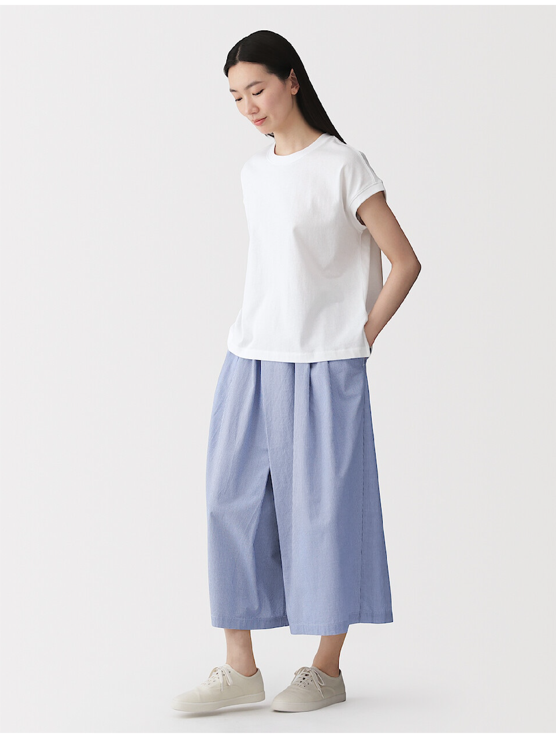 Model wearing linen dress