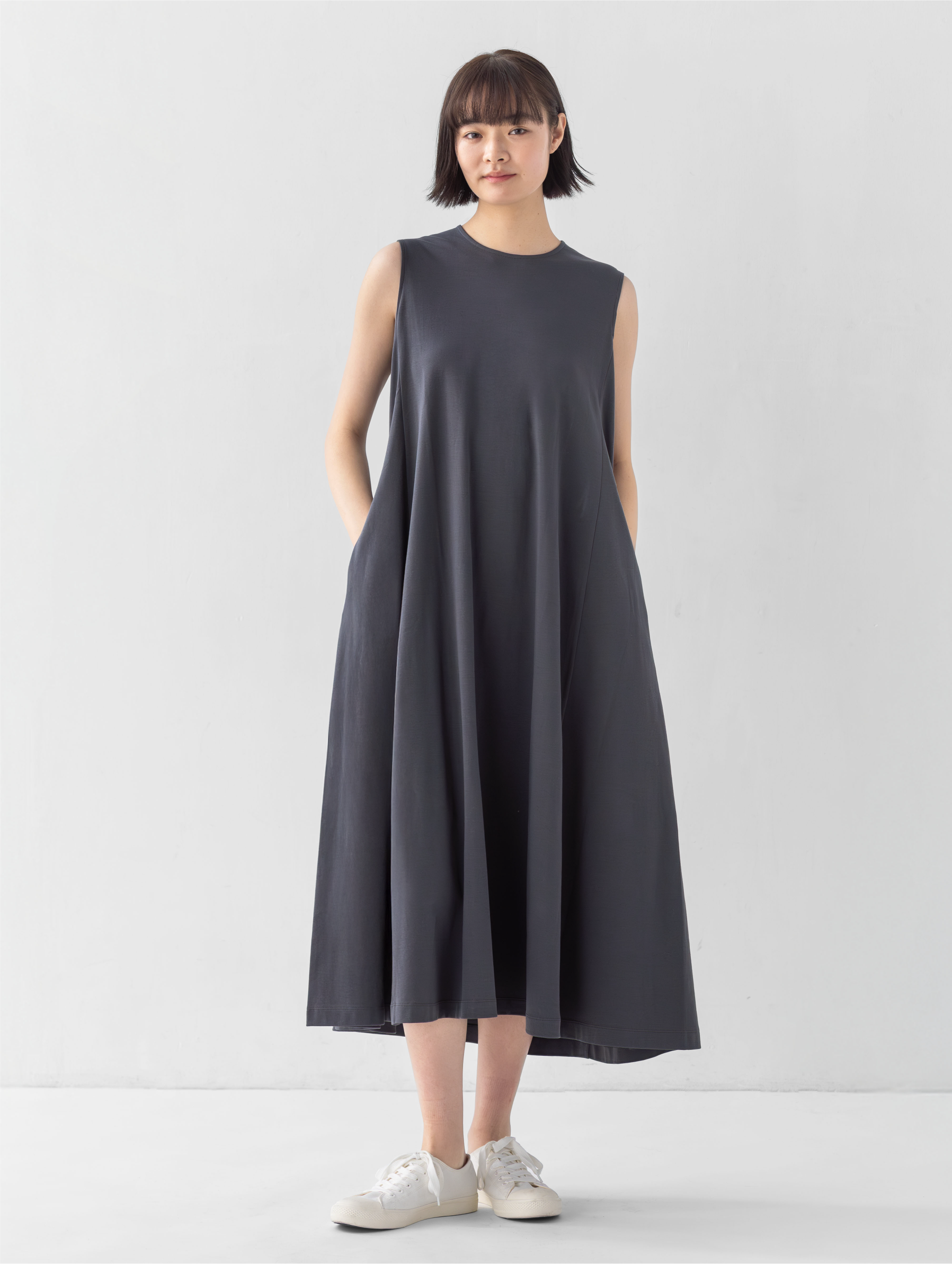 Model wearing linen dress