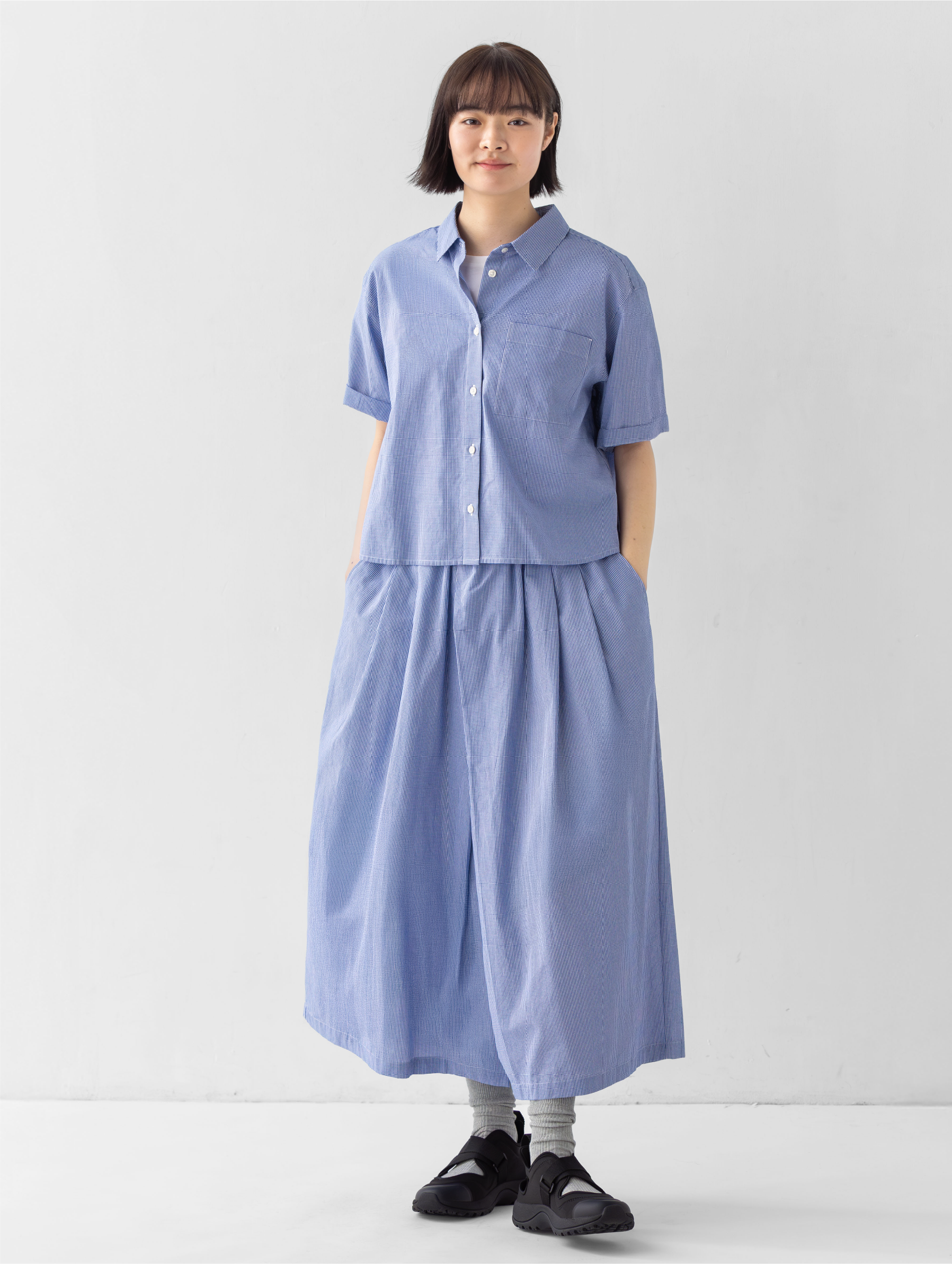 Model wearing linen dress