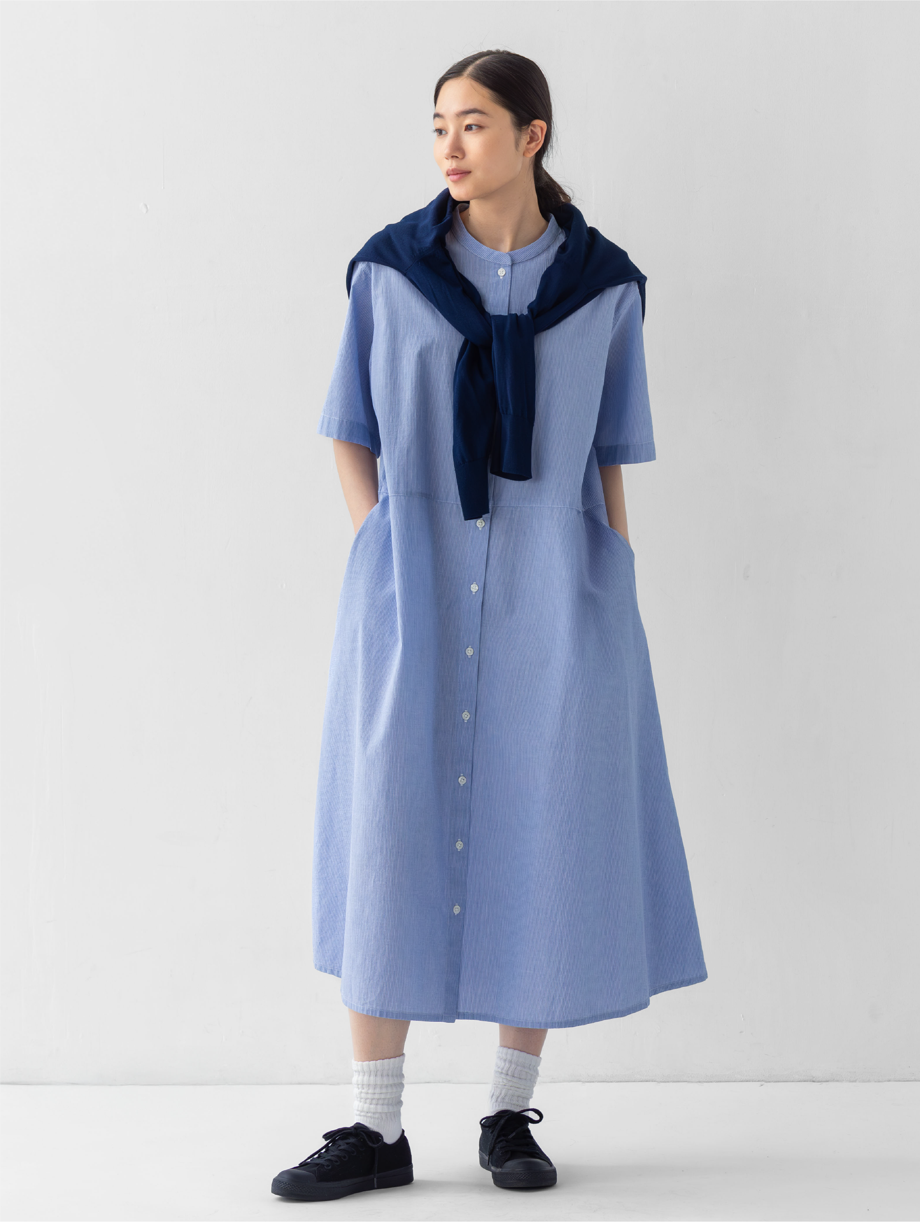 Model wearing linen dress