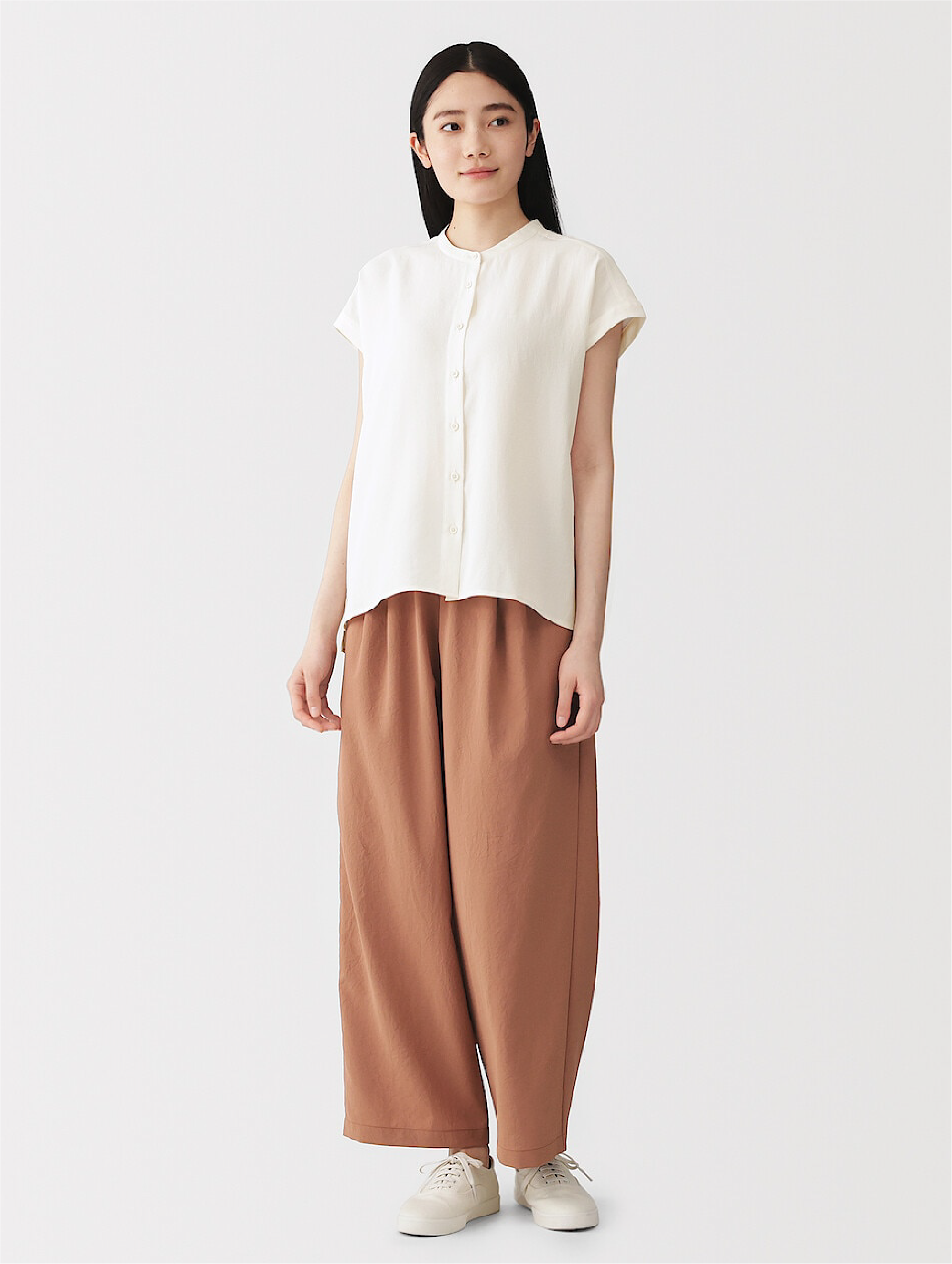 Model wearing linen dress