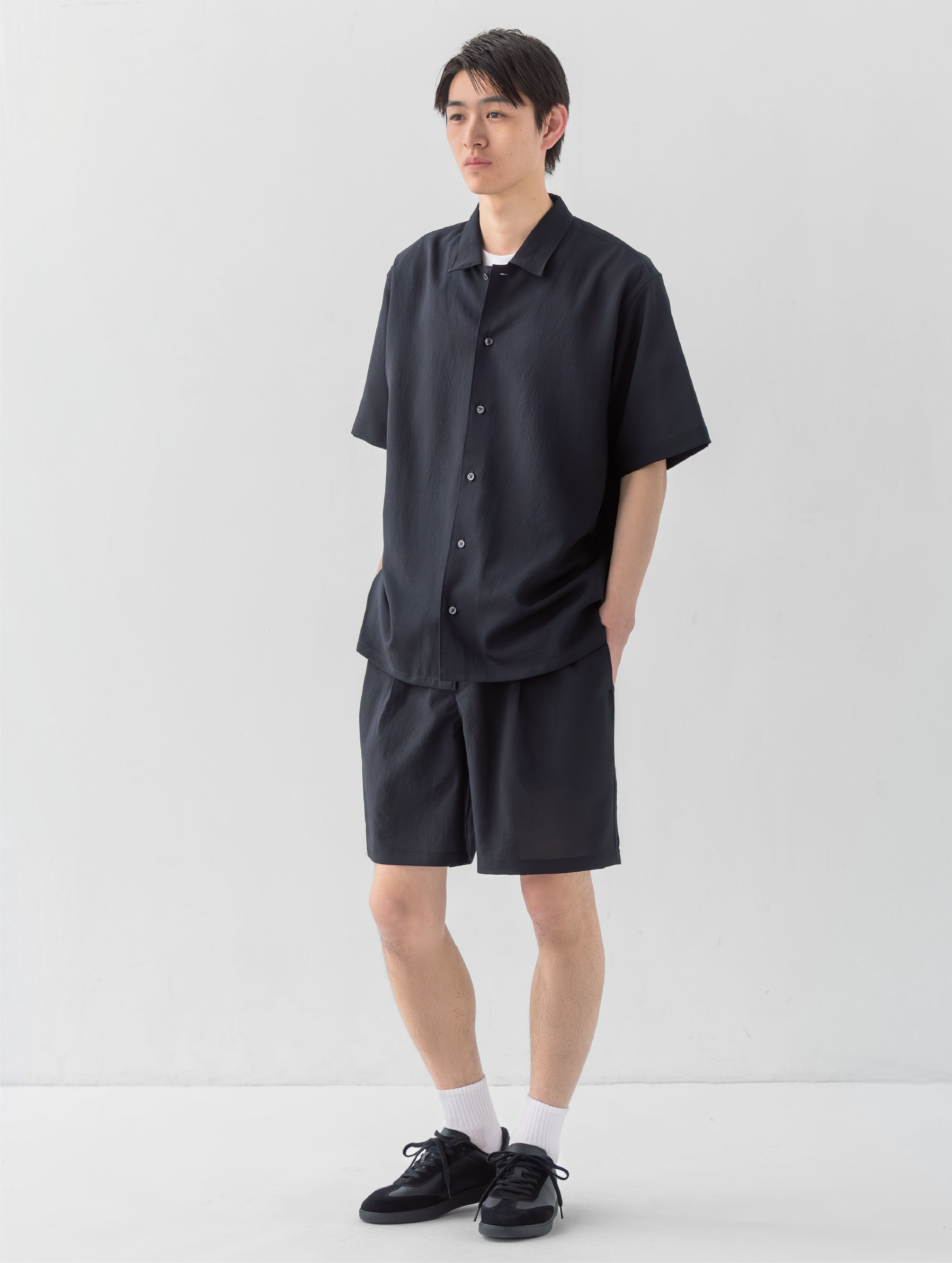 Model wearing linen dress