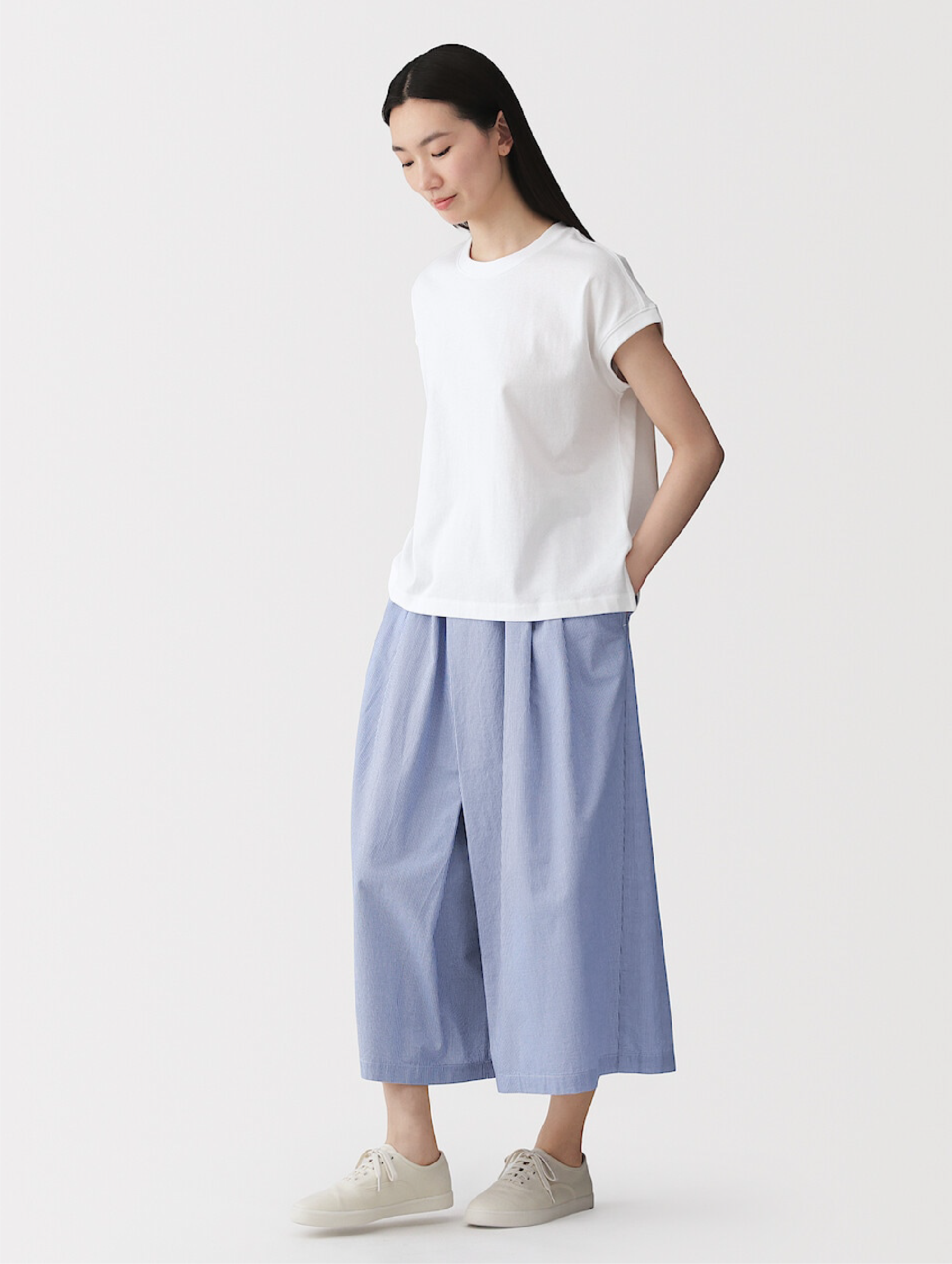 Model wearing linen dress