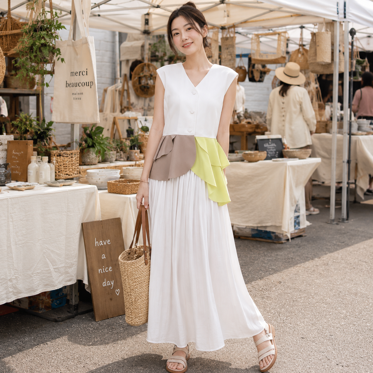 SLEEVELESS TWO TONE RUFFLED HEM BLOUSE