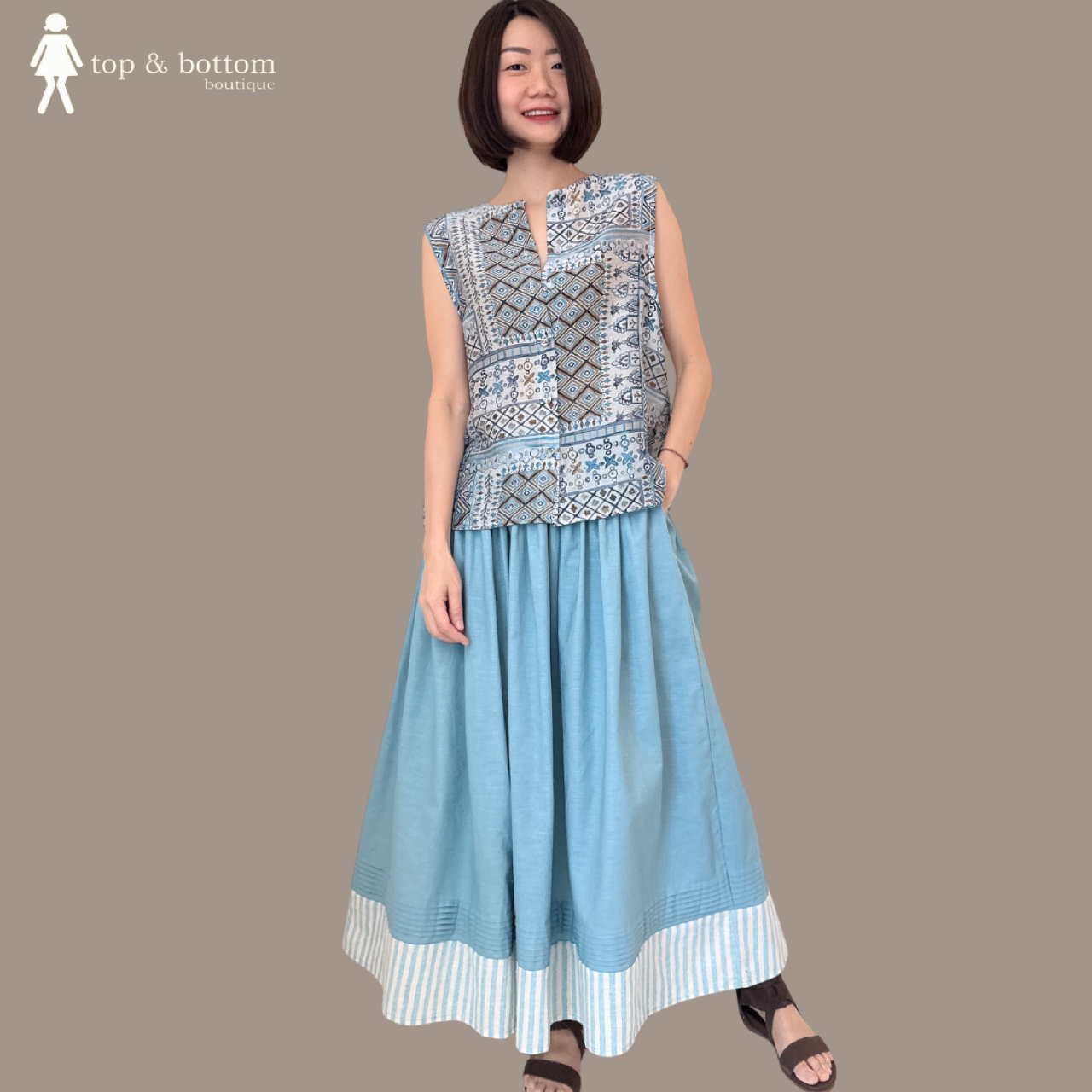ELASTIC WAISTED MIDI SKIRT WITH STRIPED HEM