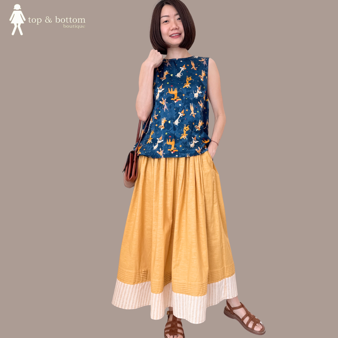 ELASTIC WAISTED MIDI SKIRT WITH STRIPED HEM