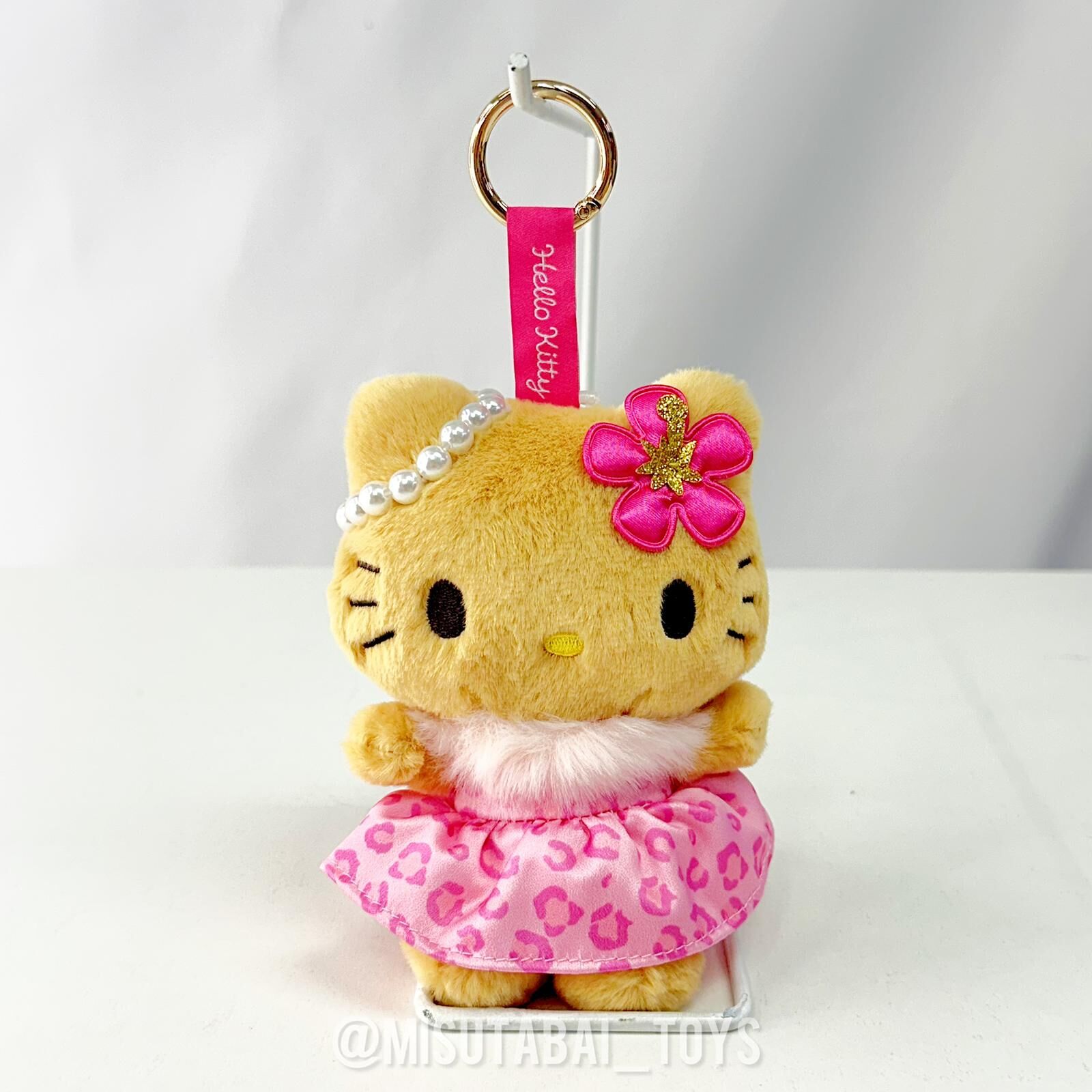 Sanrio Hello Kitty Suntanned Leopard Plush Keychain (Pink Dress)