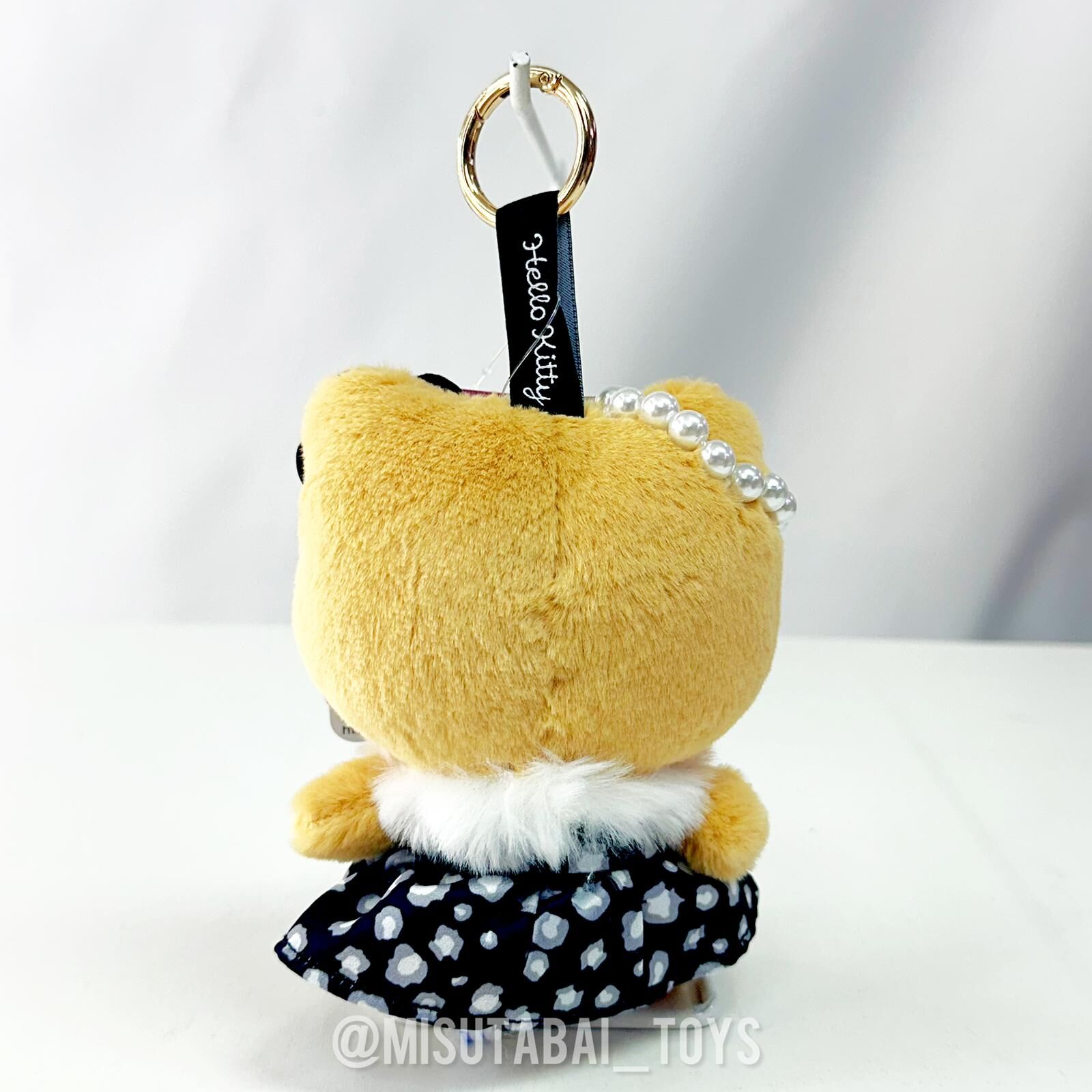 Sanrio Hello Kitty Suntanned Leopard Plush Keychain (Black Dress)