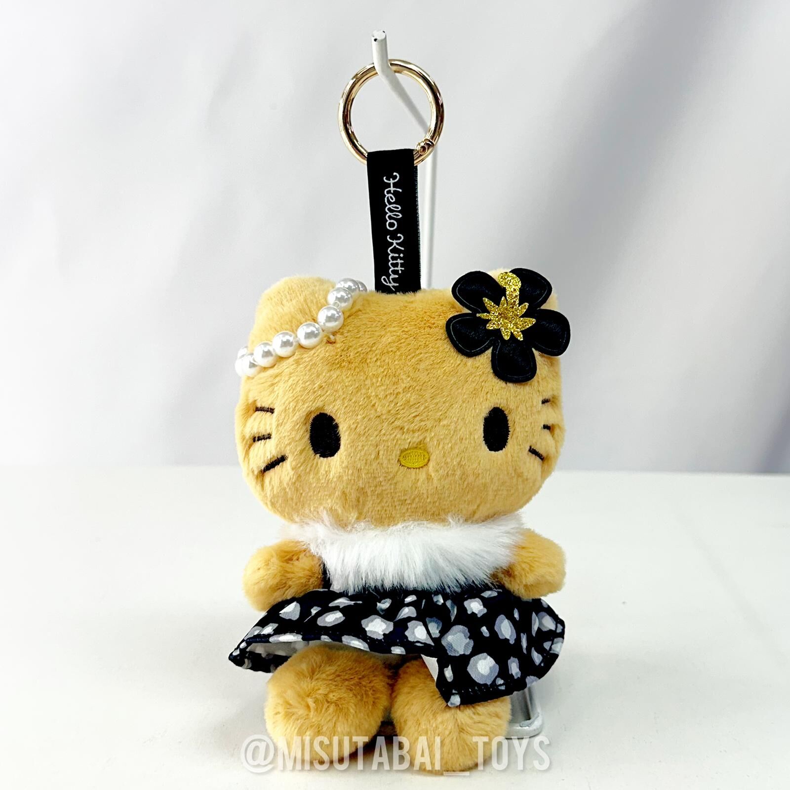 Sanrio Hello Kitty Suntanned Leopard Plush Keychain (Black Dress)