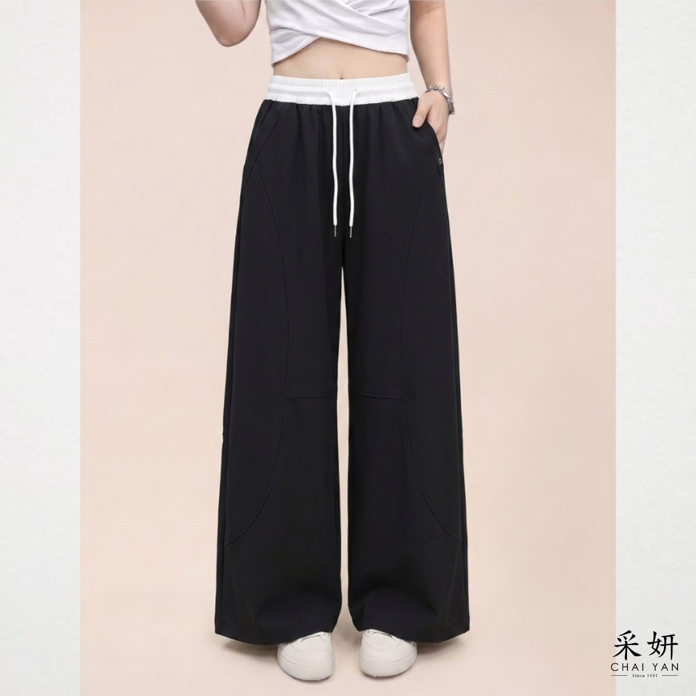 跳色雙口袋休閒彎刀長褲