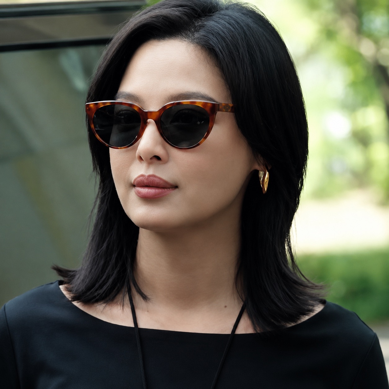 CARIN 琥珀紋貓眼太陽眼鏡