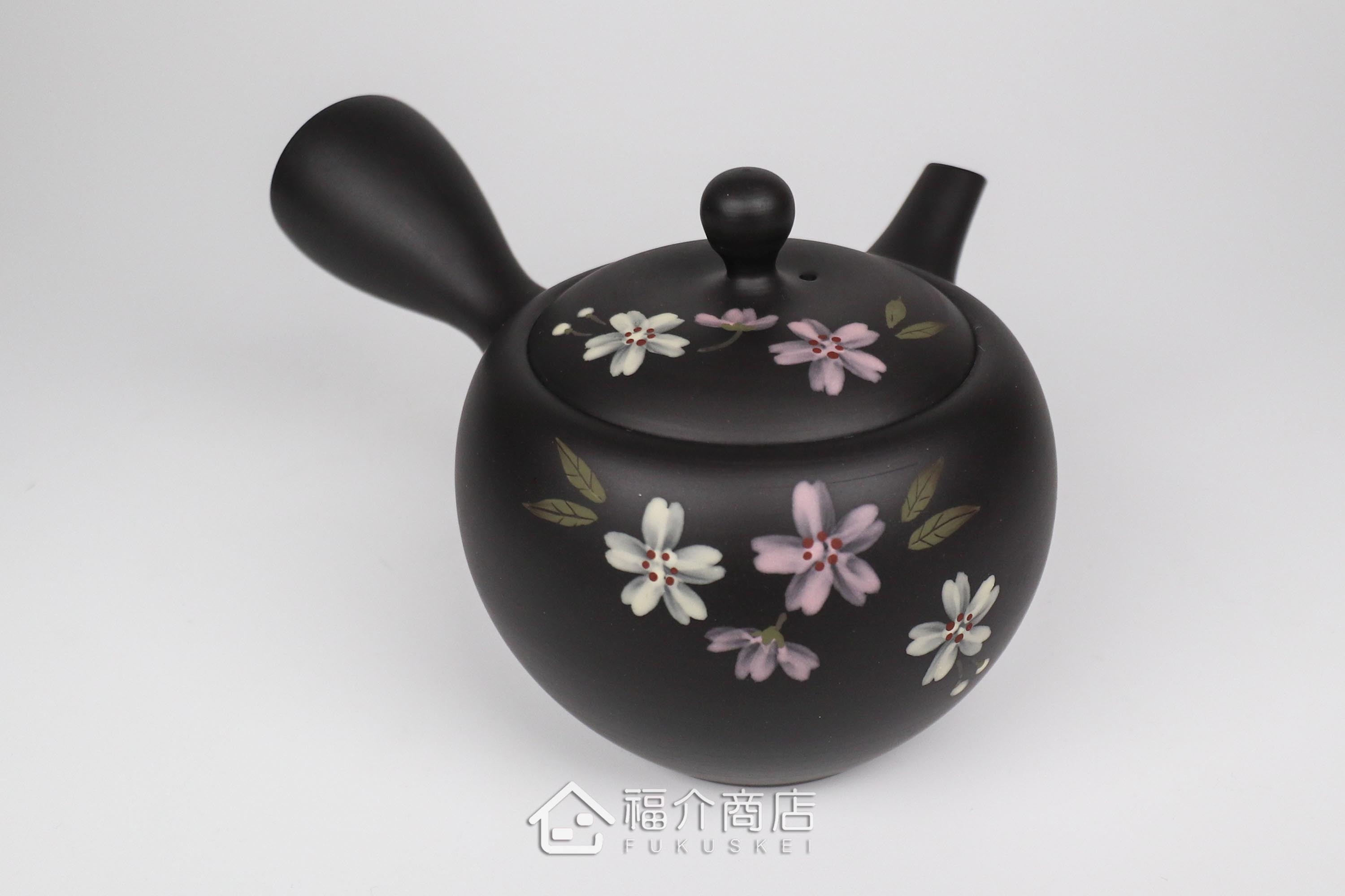 泡茶用的日本陶瓷茶壺,整體是沉穩優雅的黑色,壺身有櫻花圖樣