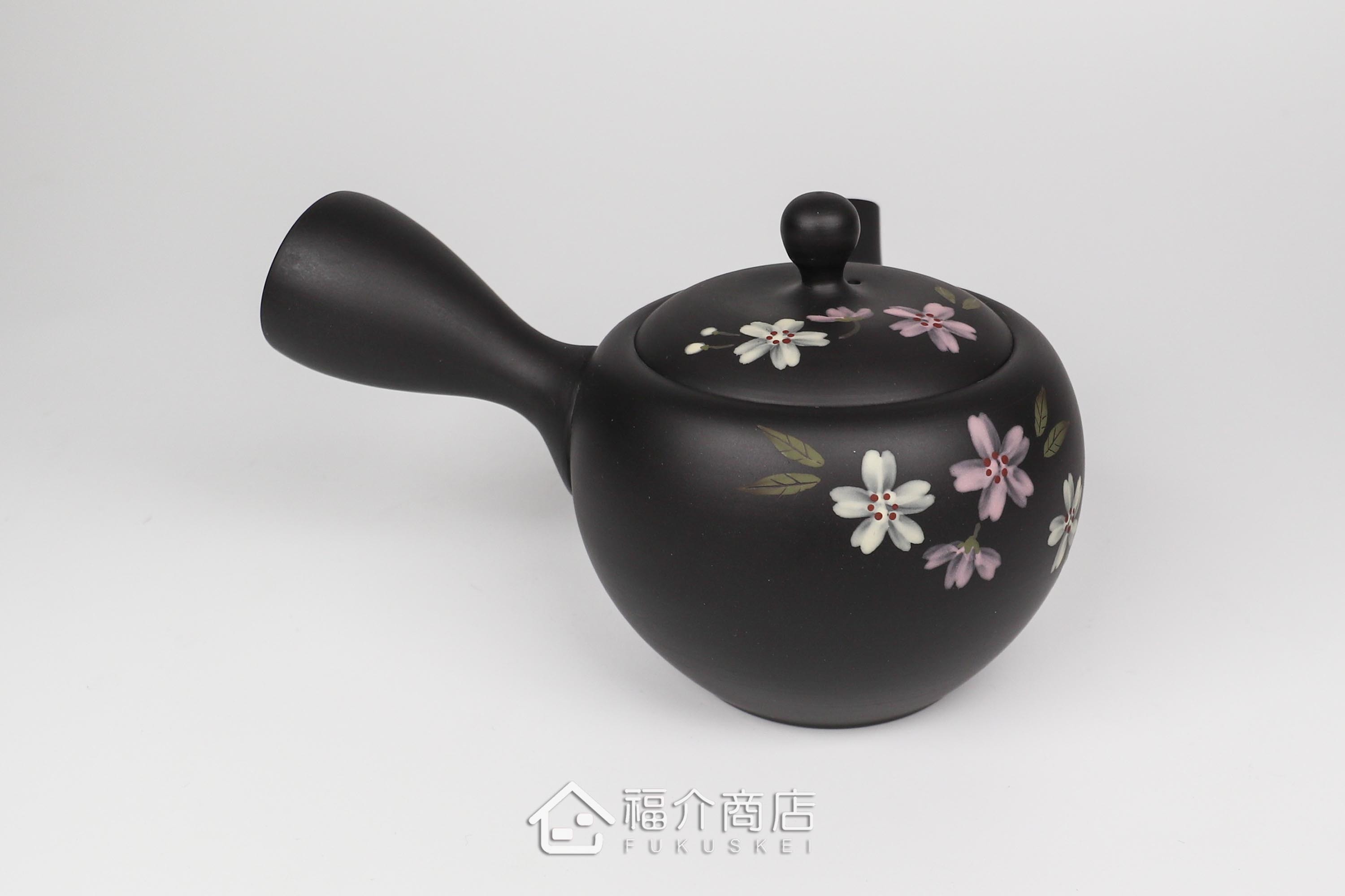 泡茶用的日本陶瓷茶壺,壺身有櫻花圖樣