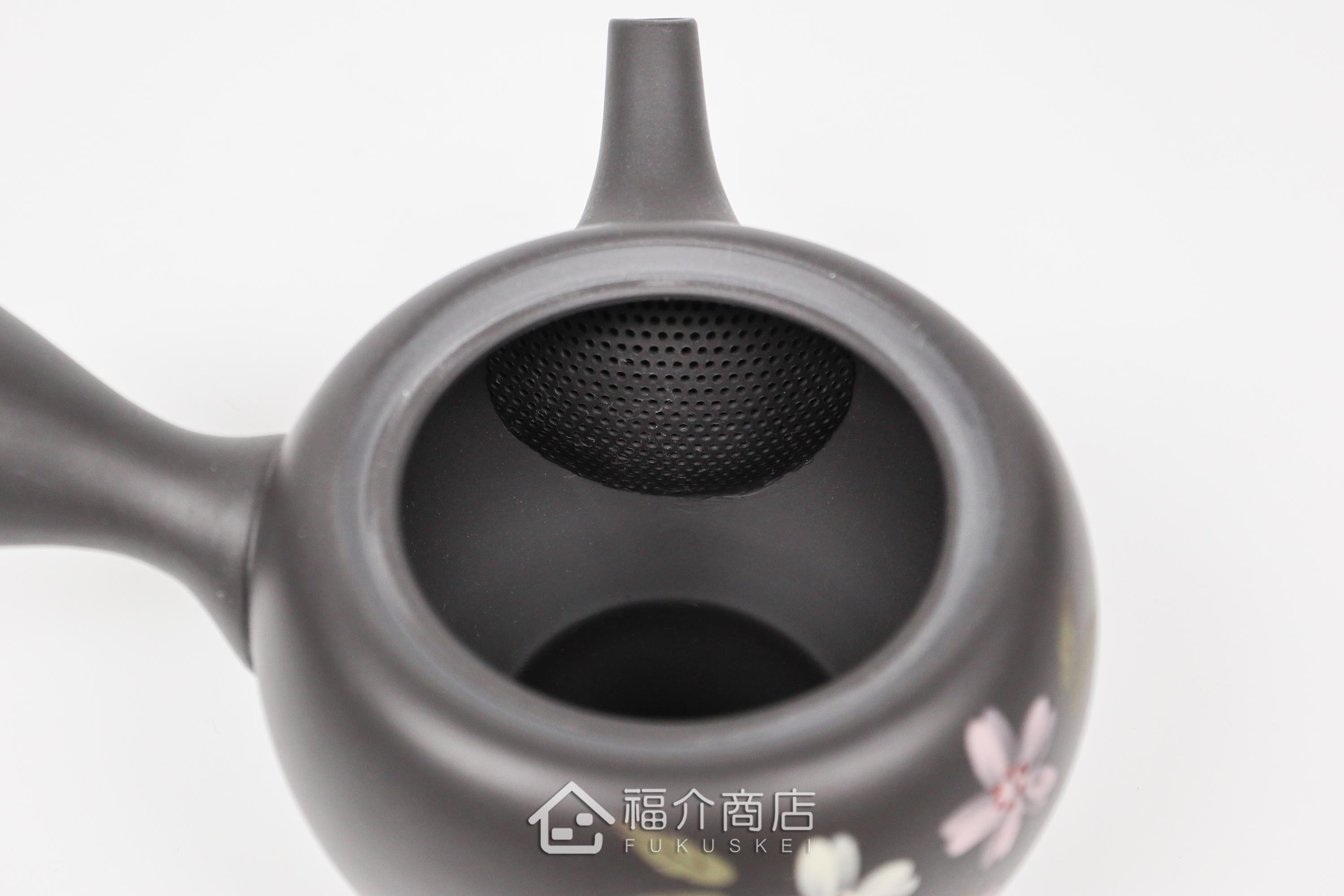 泡茶用的日本陶瓷茶壺,壺身有櫻花圖樣