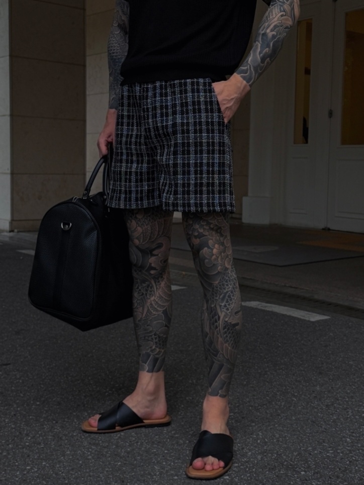 Lined tweed pleated shorts