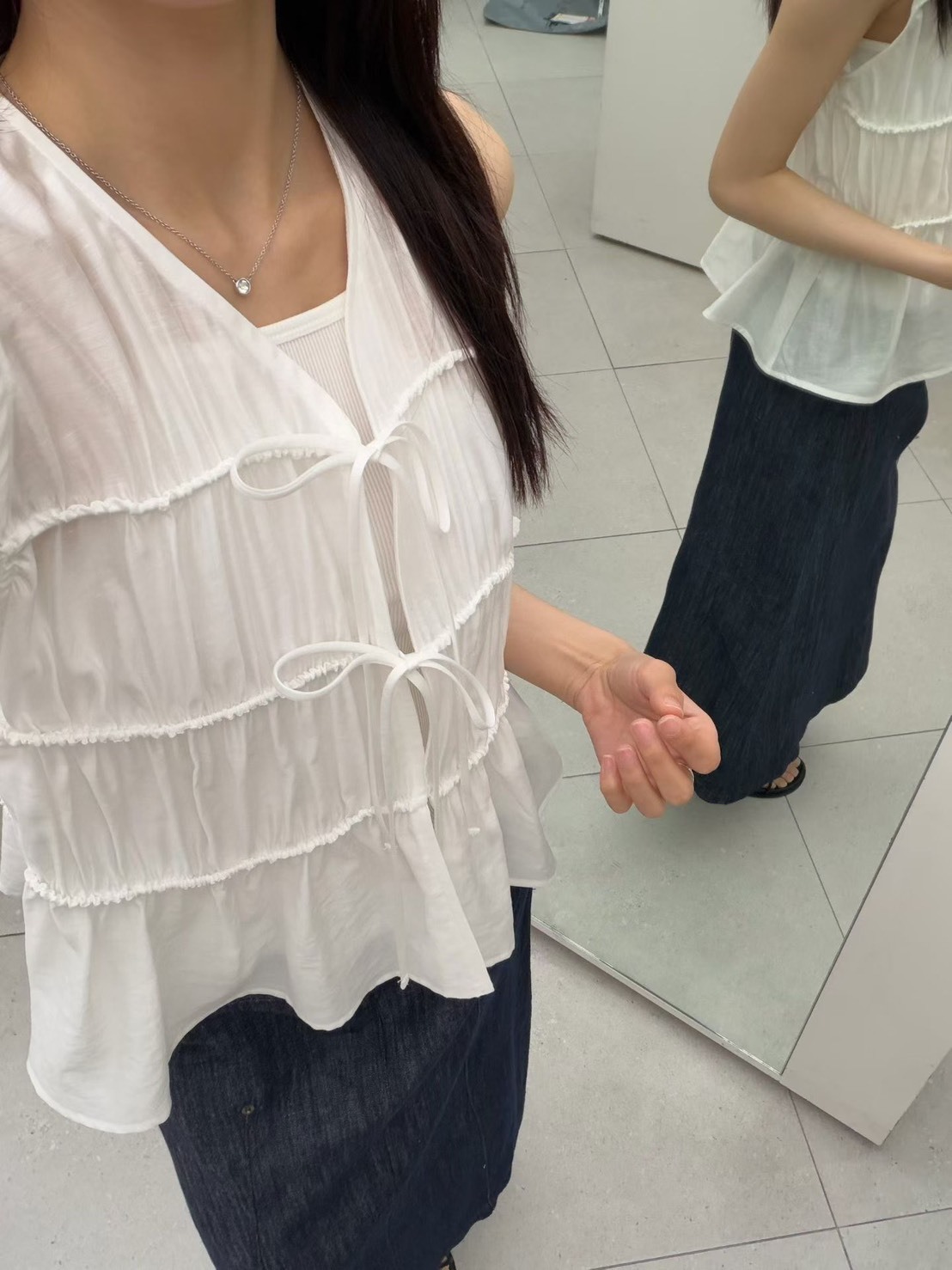 綁結縐摺傘襬背心