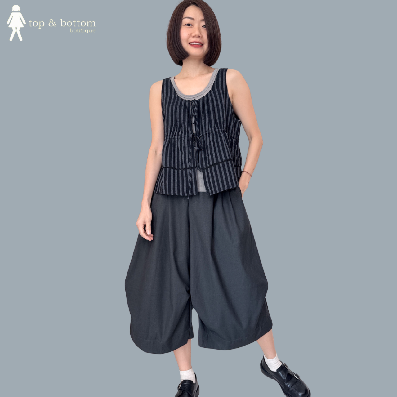 SLEEVELESS RIBBON FRONT STRIPED BLOUSE WITH INNER SINGLET
