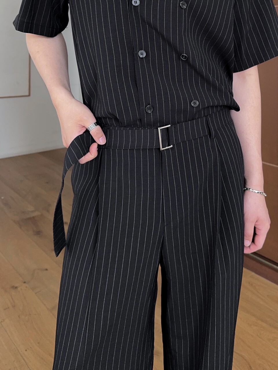 Belted pleated suit trousers