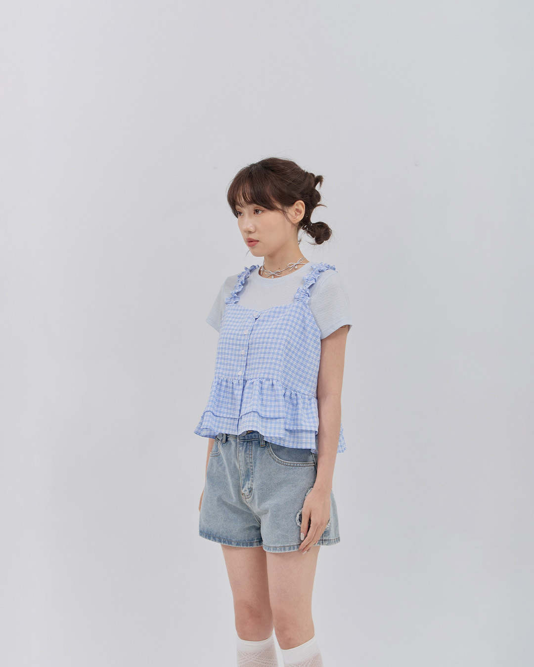 Color-blocked plaid vest with ruffled shoulder straps and button closure. Available in two colors.【01099803】in stock+pre-order