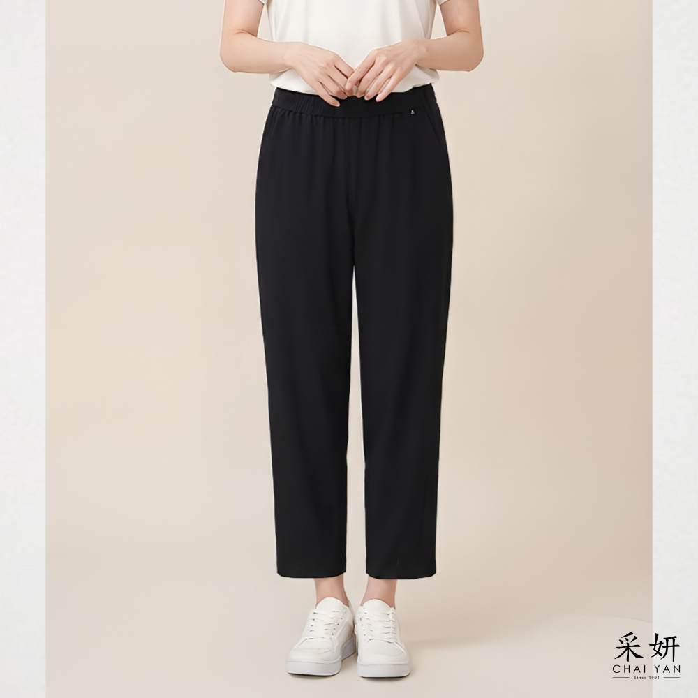 素色彎刀拼接休閒褲