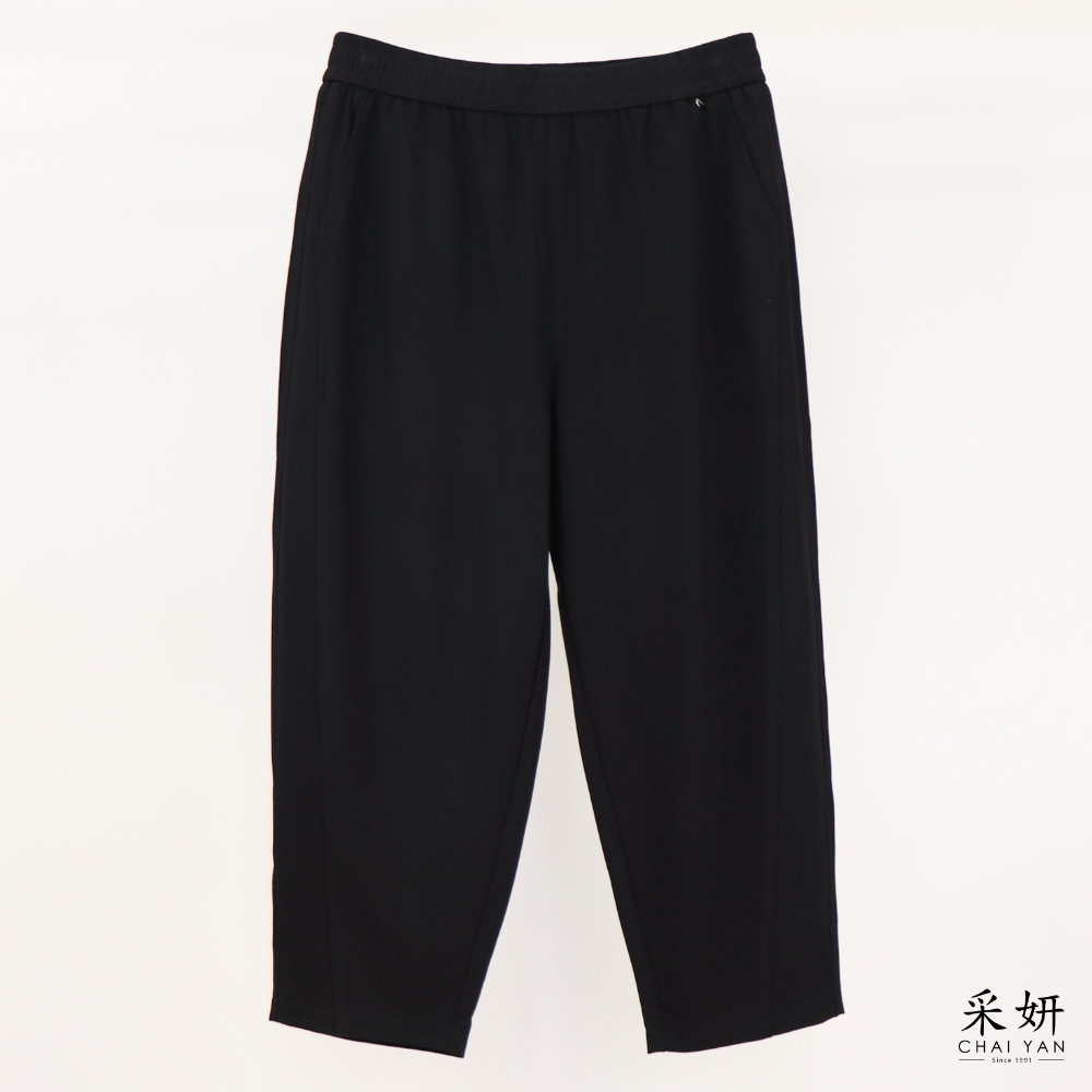 素色彎刀拼接休閒褲