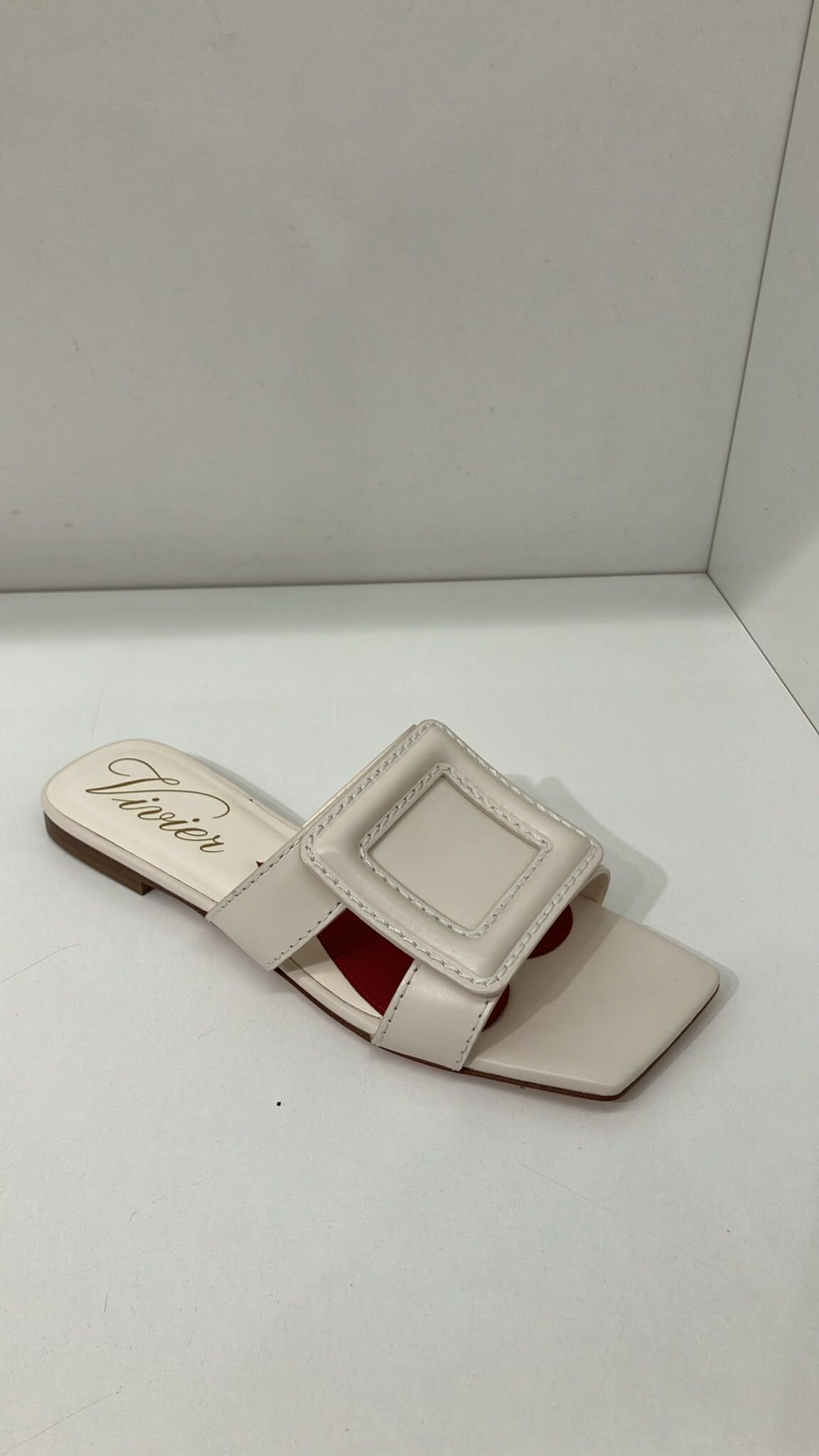 Roger Vivier RV covered buckle leather mules white brown