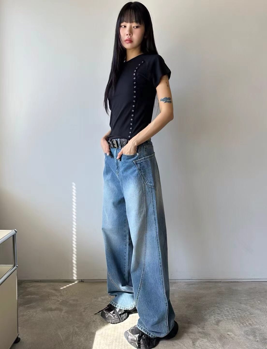 不規則口袋彎刀牛仔長褲