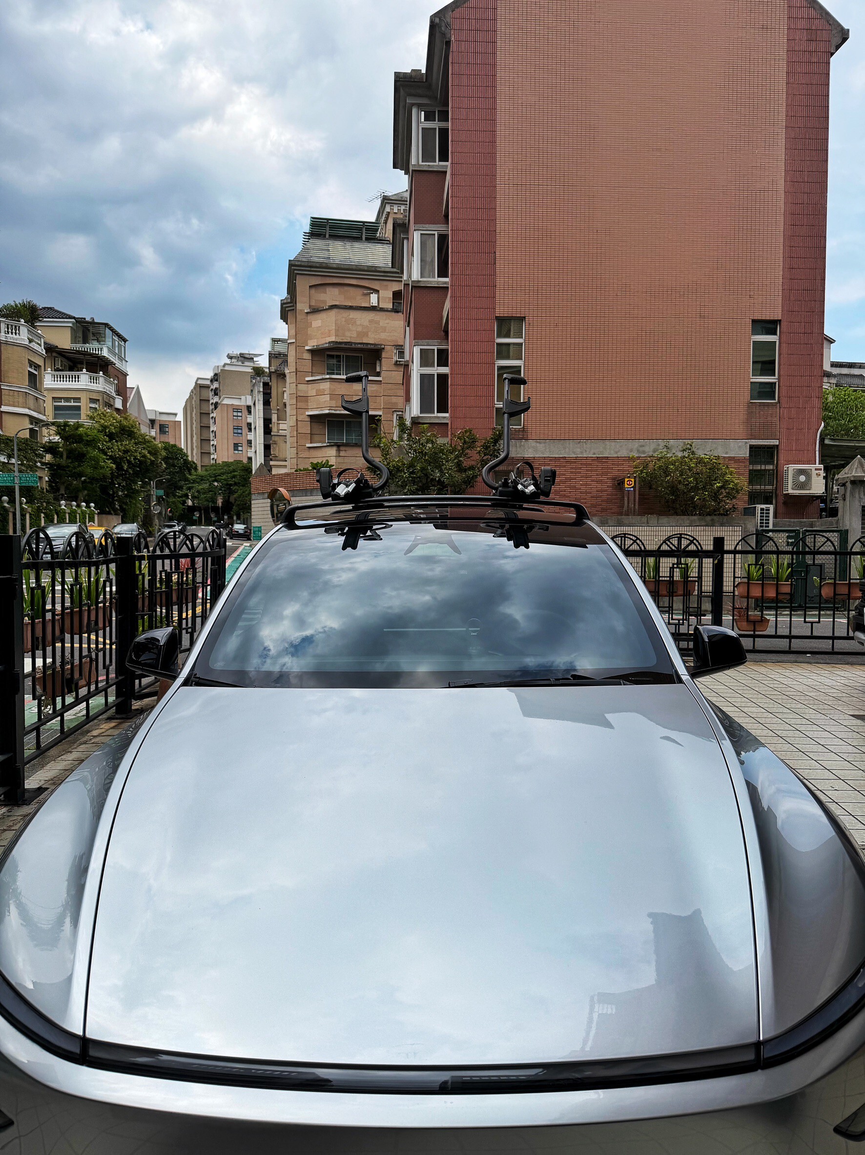 THULE ProRide 598B roof bike rack installed on Tesla Model Y