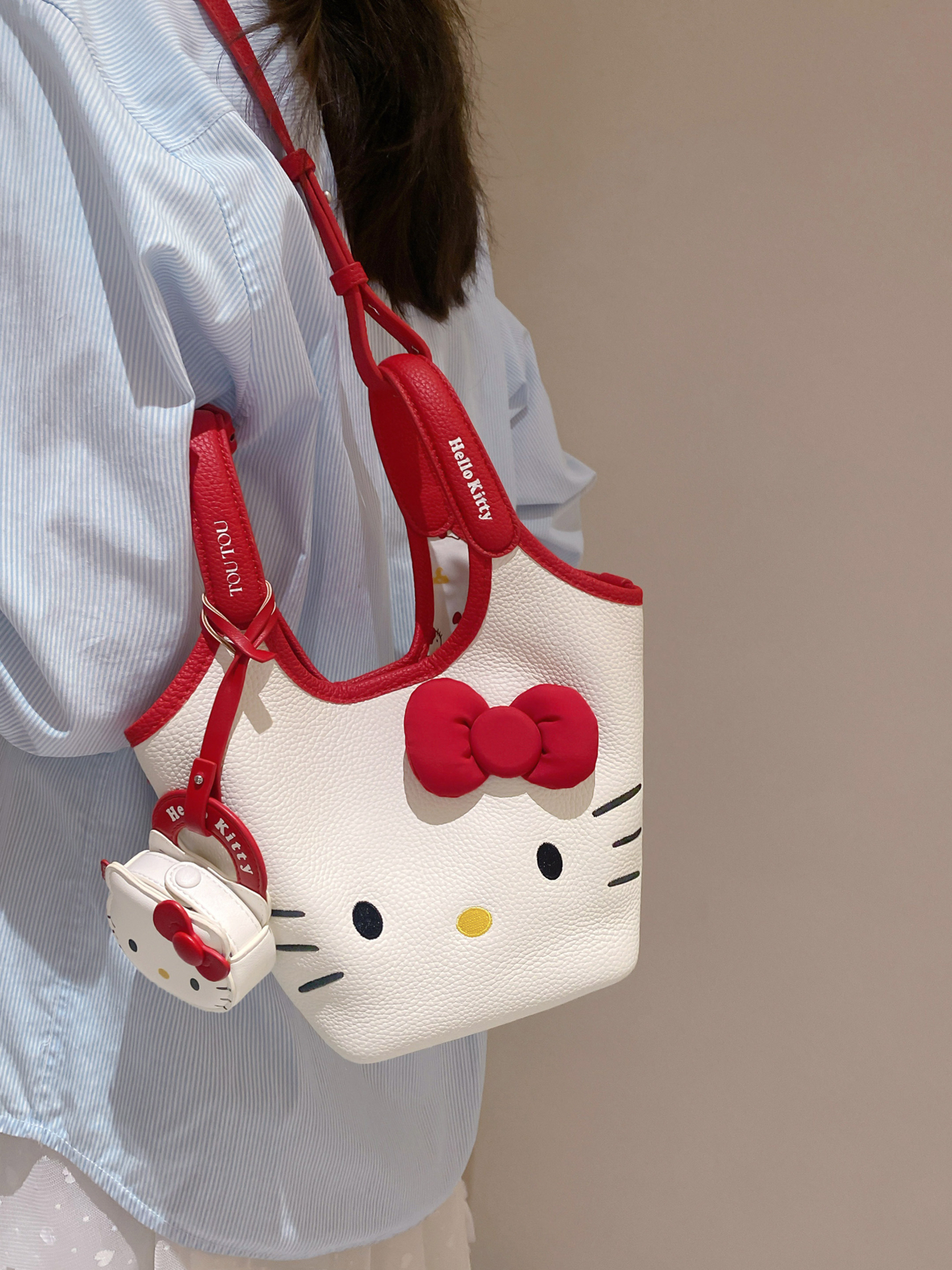 代購-『買一送二⁉️』TOUTOU × hellokitty 聯名款 正版授權 "天生一對" 水桶包 手提包