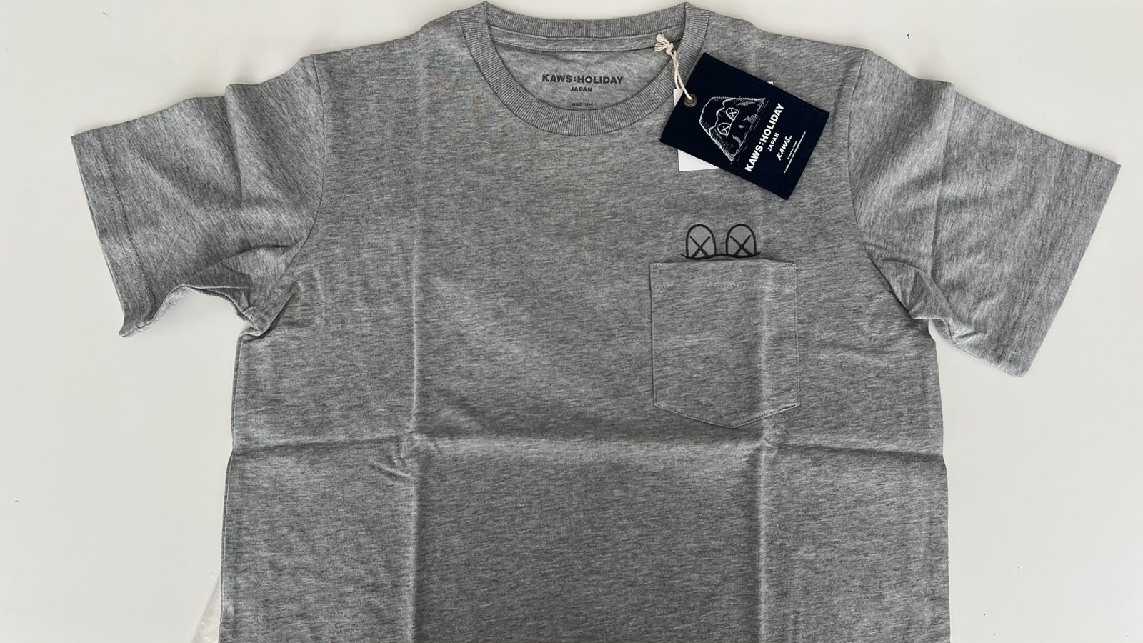 Kaws holiday tee