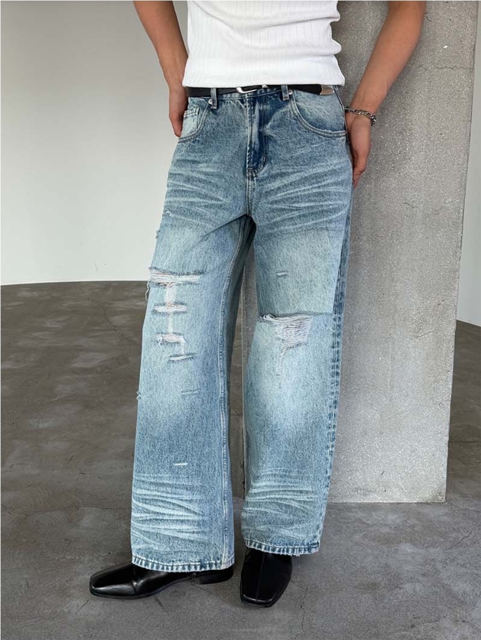 Distressed denim jeans