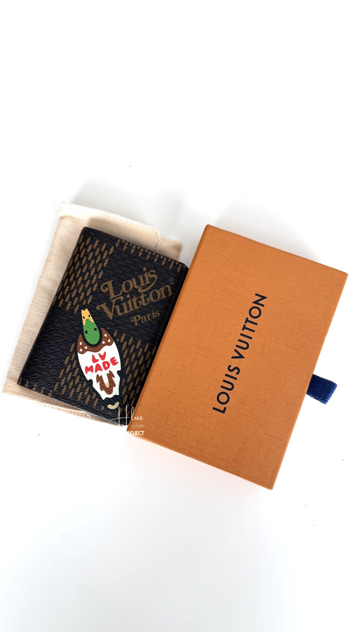 Human made X LV card holder by Nigo