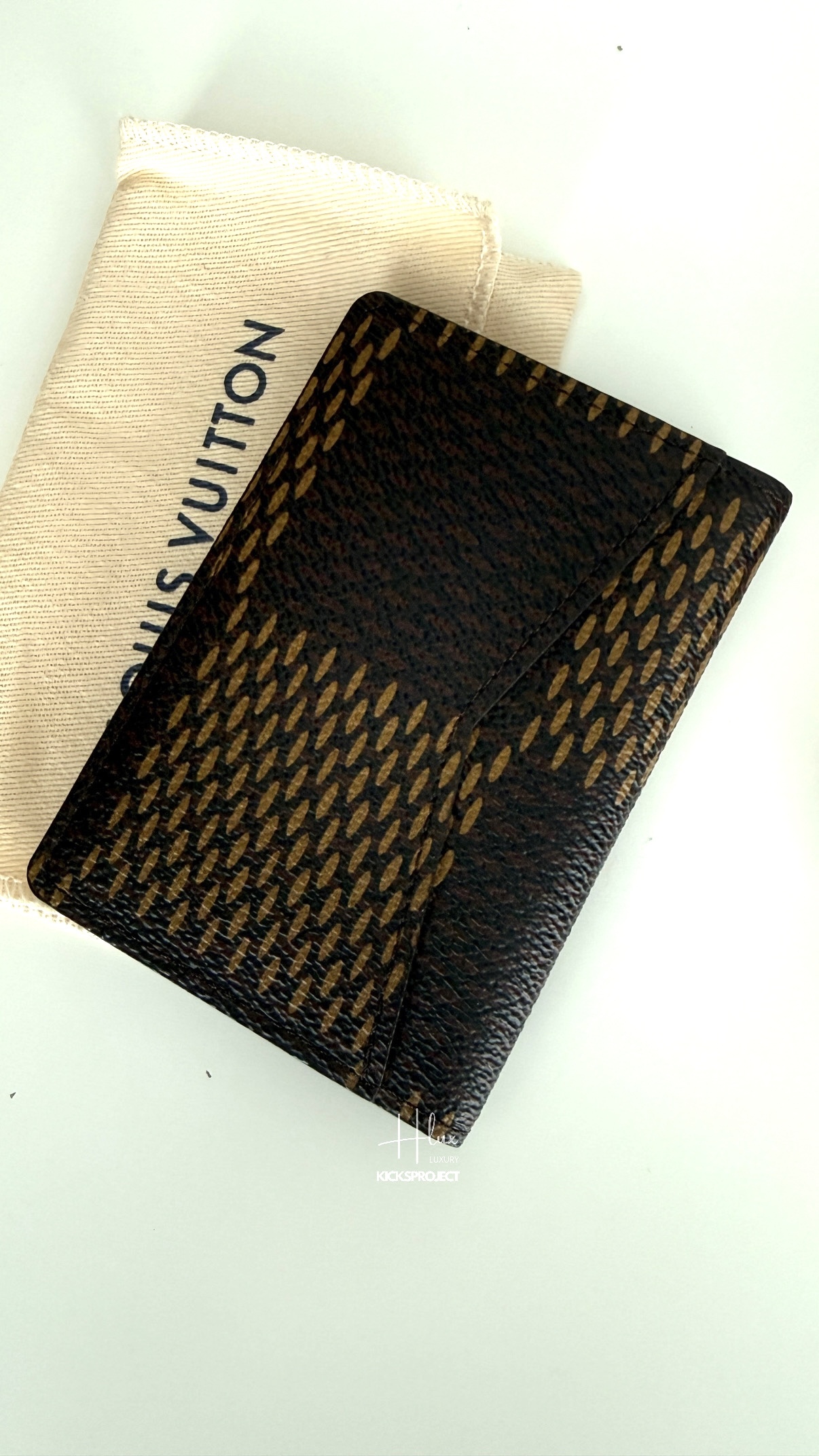 Human made X LV card holder by Nigo