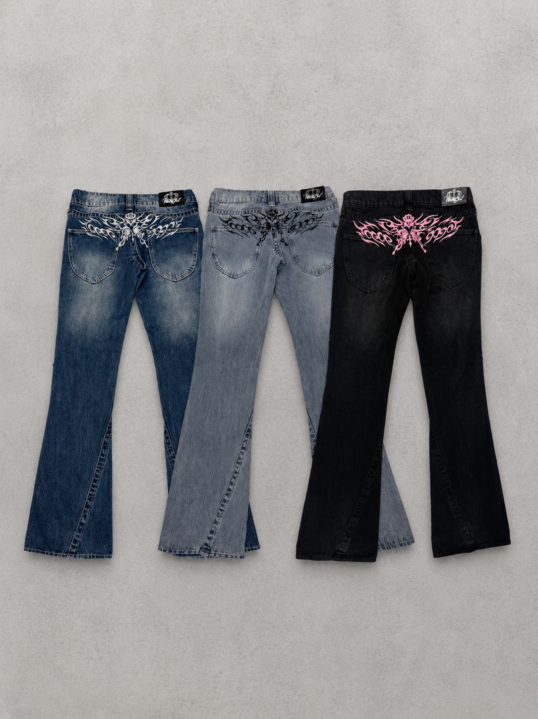 Tribal Logo Low-Rise Denim Pants