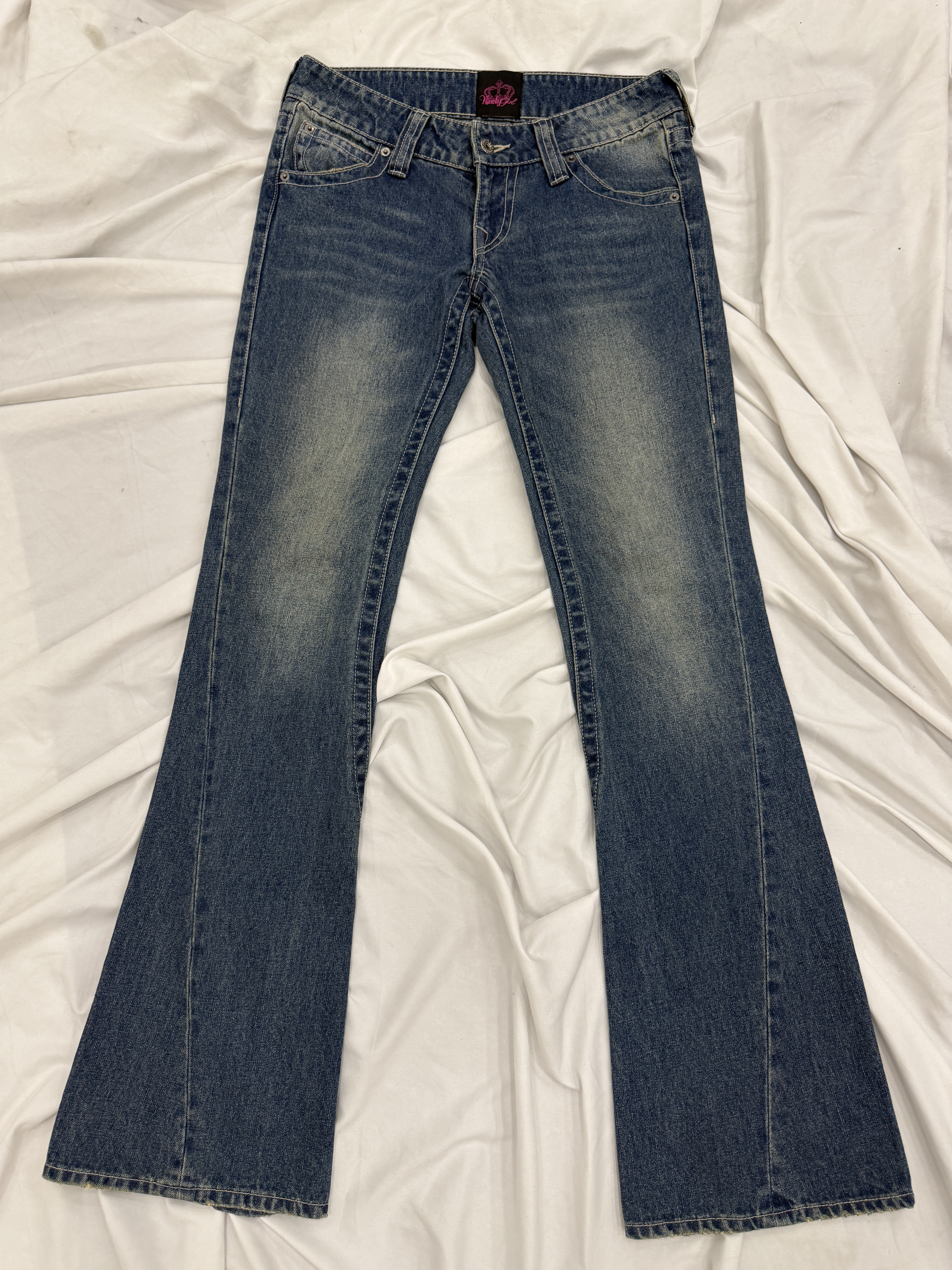 Tribal Logo Low-Rise Denim Pants