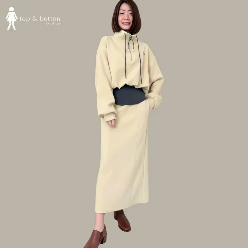 TIE-STRING HIGH NECK ZIPPED SWEATER